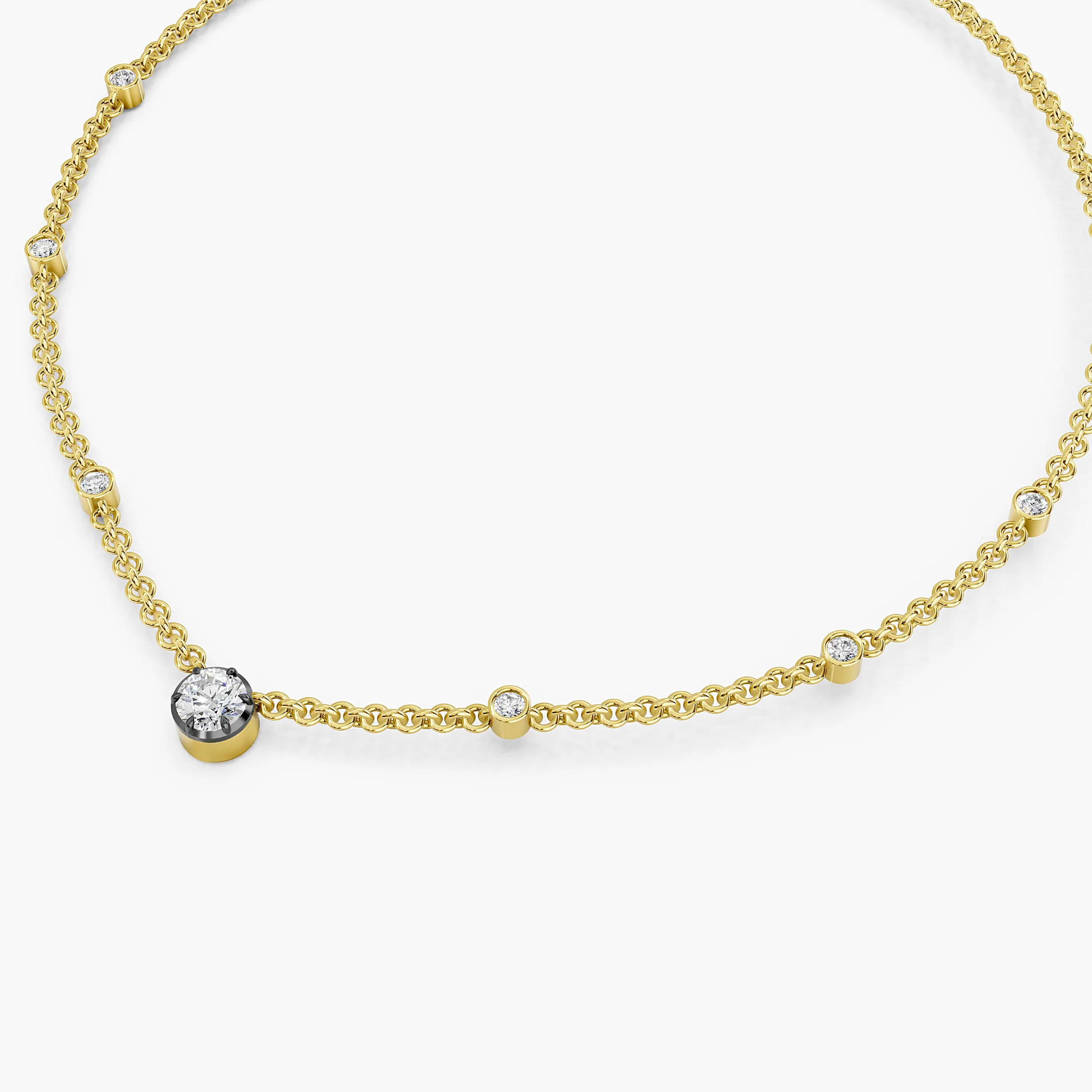 Seven-stone necklace with a larger round center diamond and six smaller round diamonds spaced along the chain