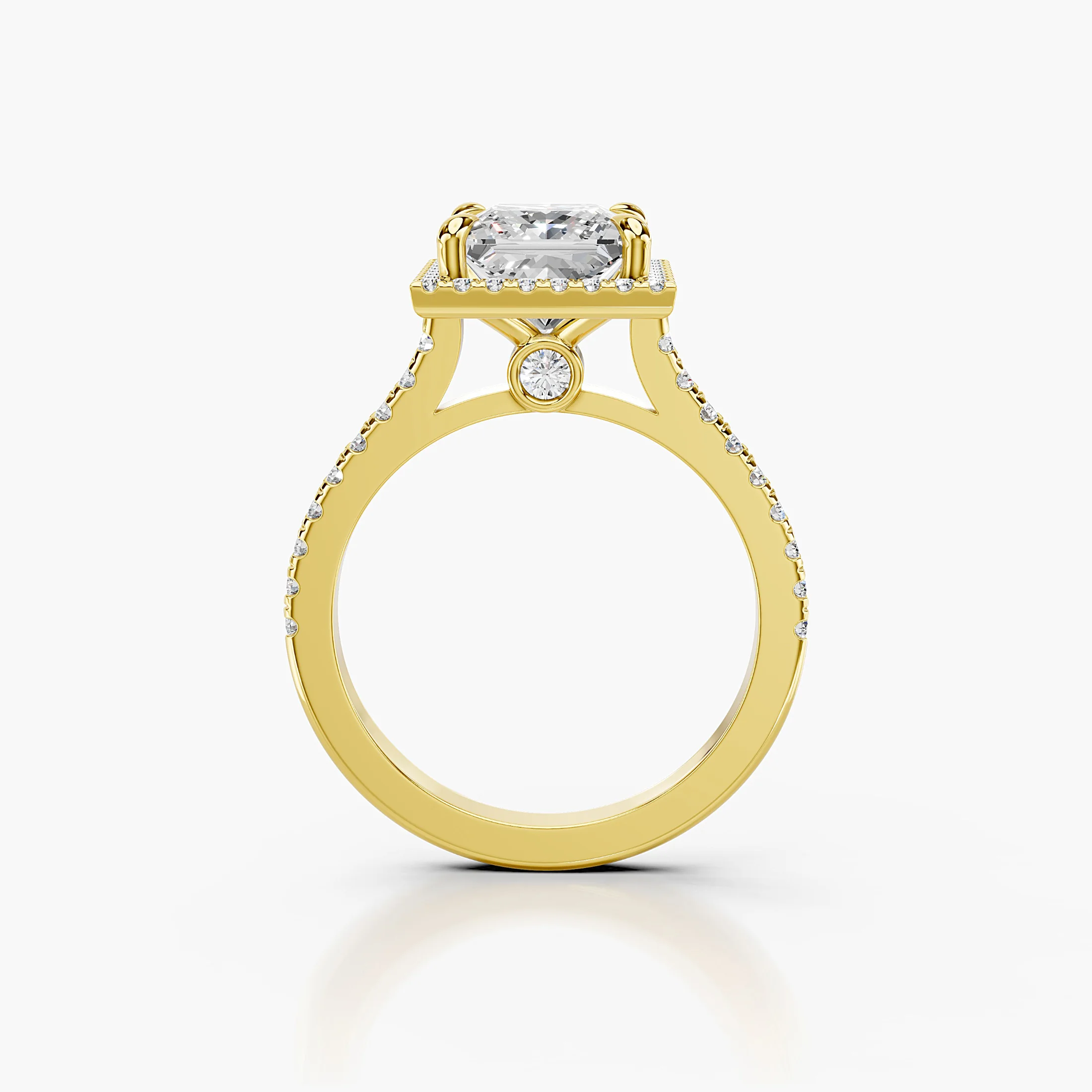 Princess-cut lab-grown diamond engagement ring with a square halo and diamond-set band.