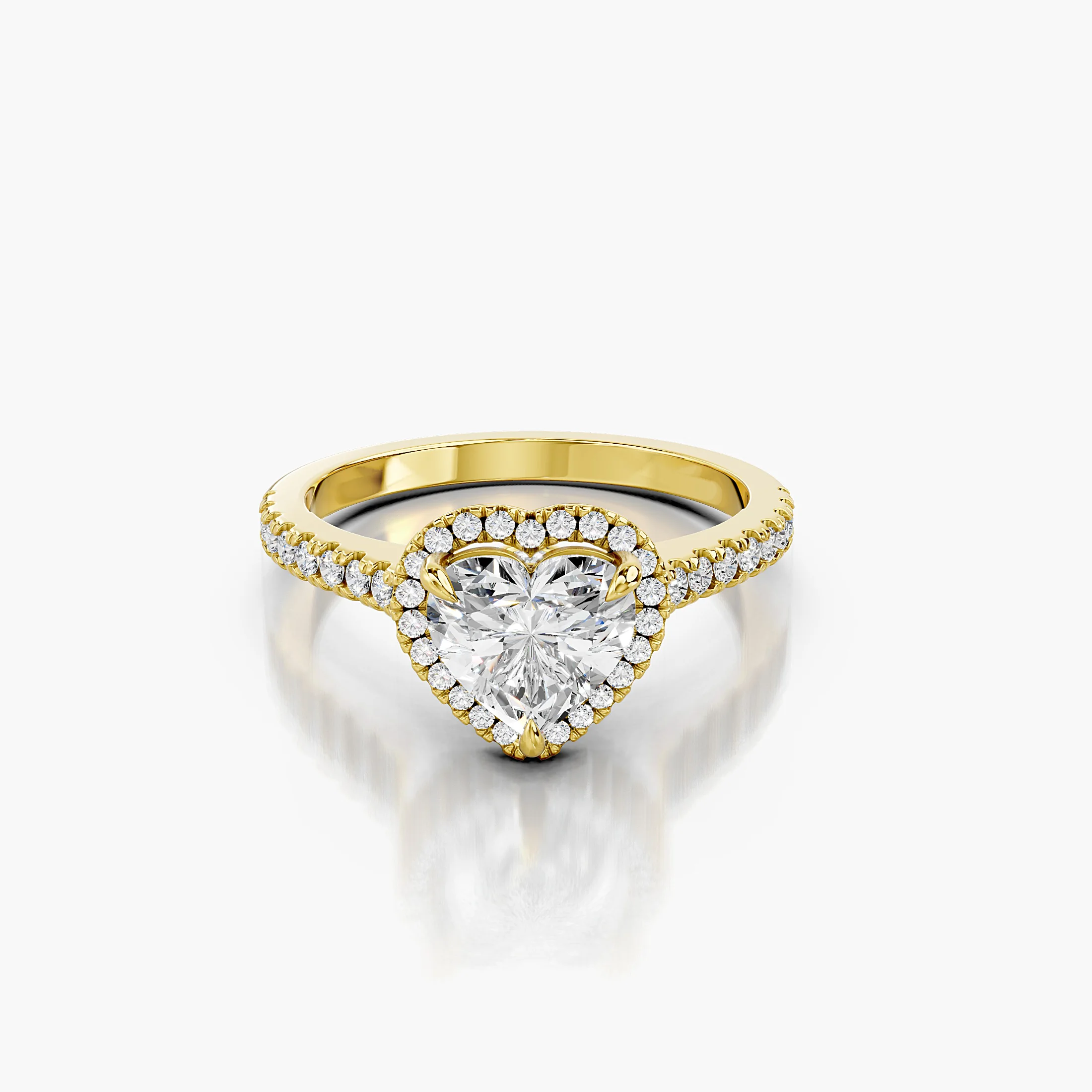 Heart-cut lab-grown diamond engagement ring with a matching halo and diamond-set band.
