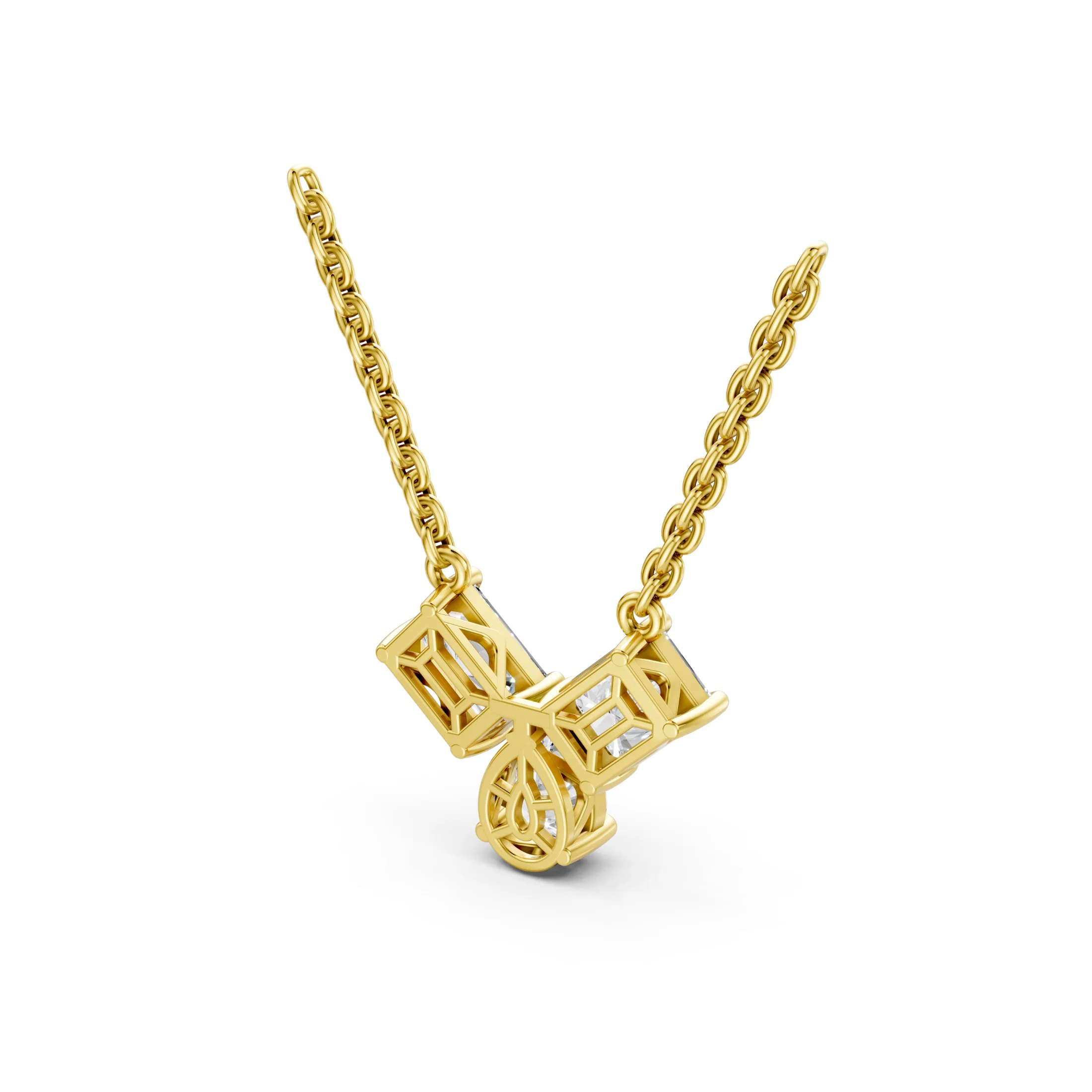 Radiant and pear-cut diamond multi-stone necklace with three diamonds arranged in a V-shaped vertical drop.