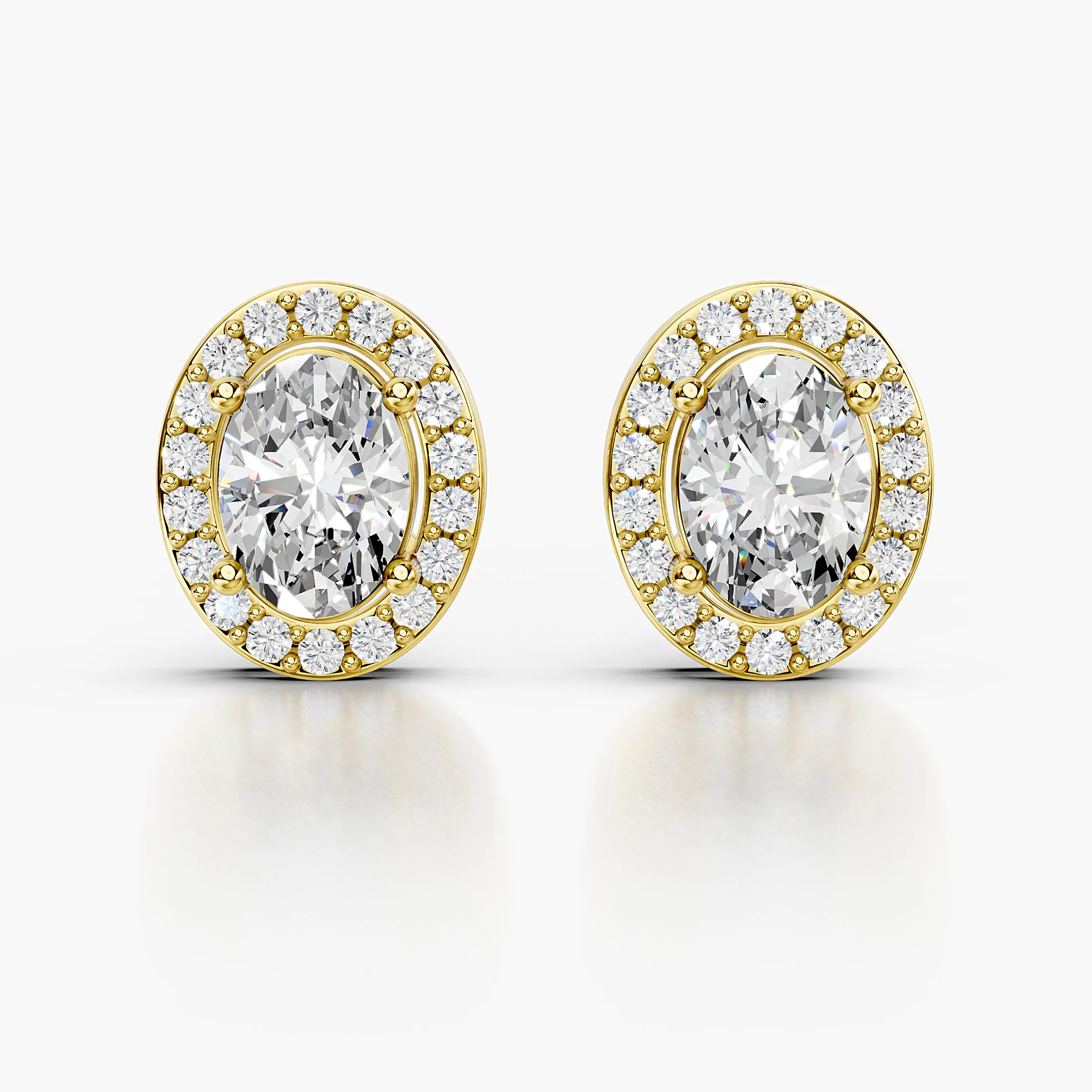 Oval diamond stud earrings with continuous round diamond halos and screw-back closures