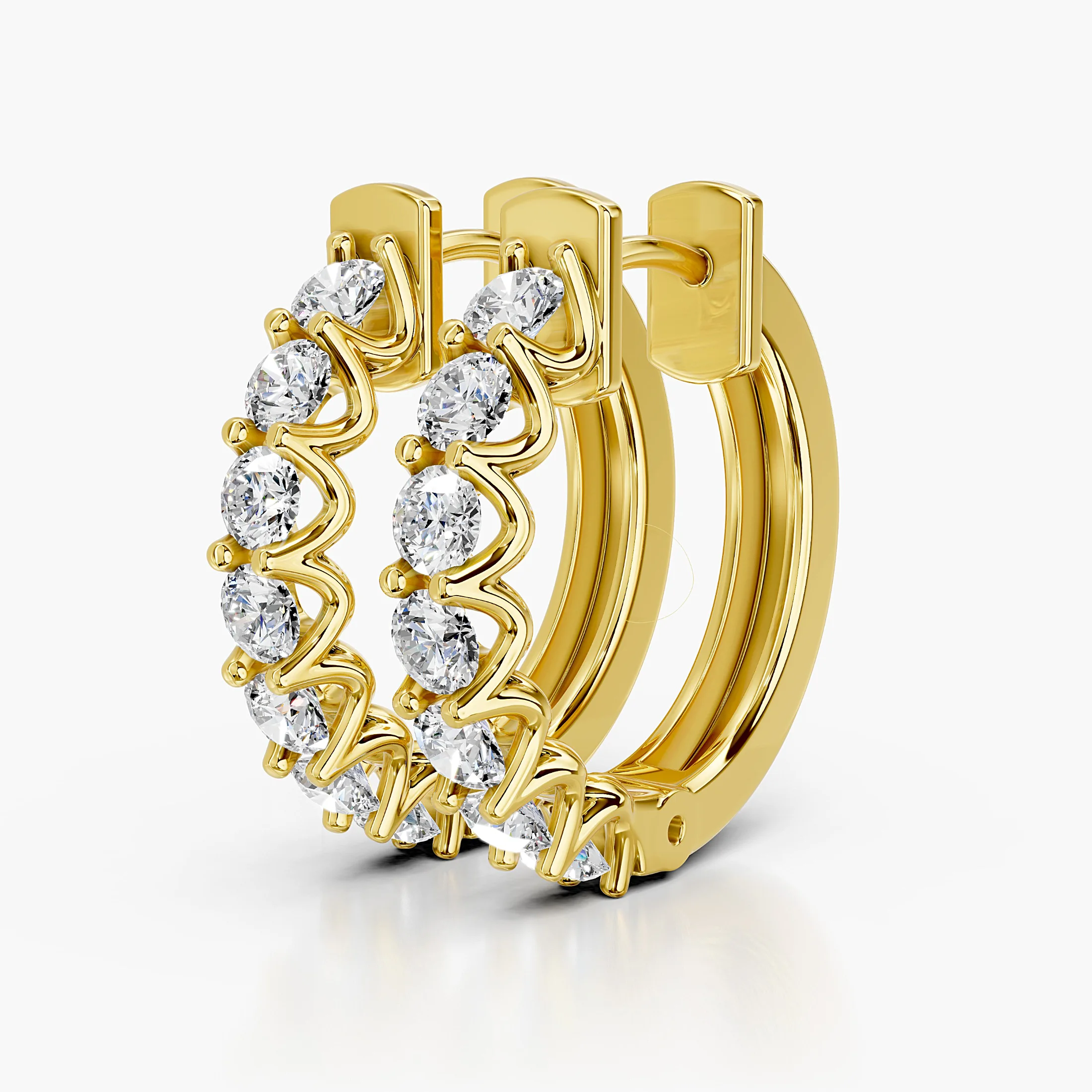 Round diamond seven-stone hoop earrings with shared-prong settings.
