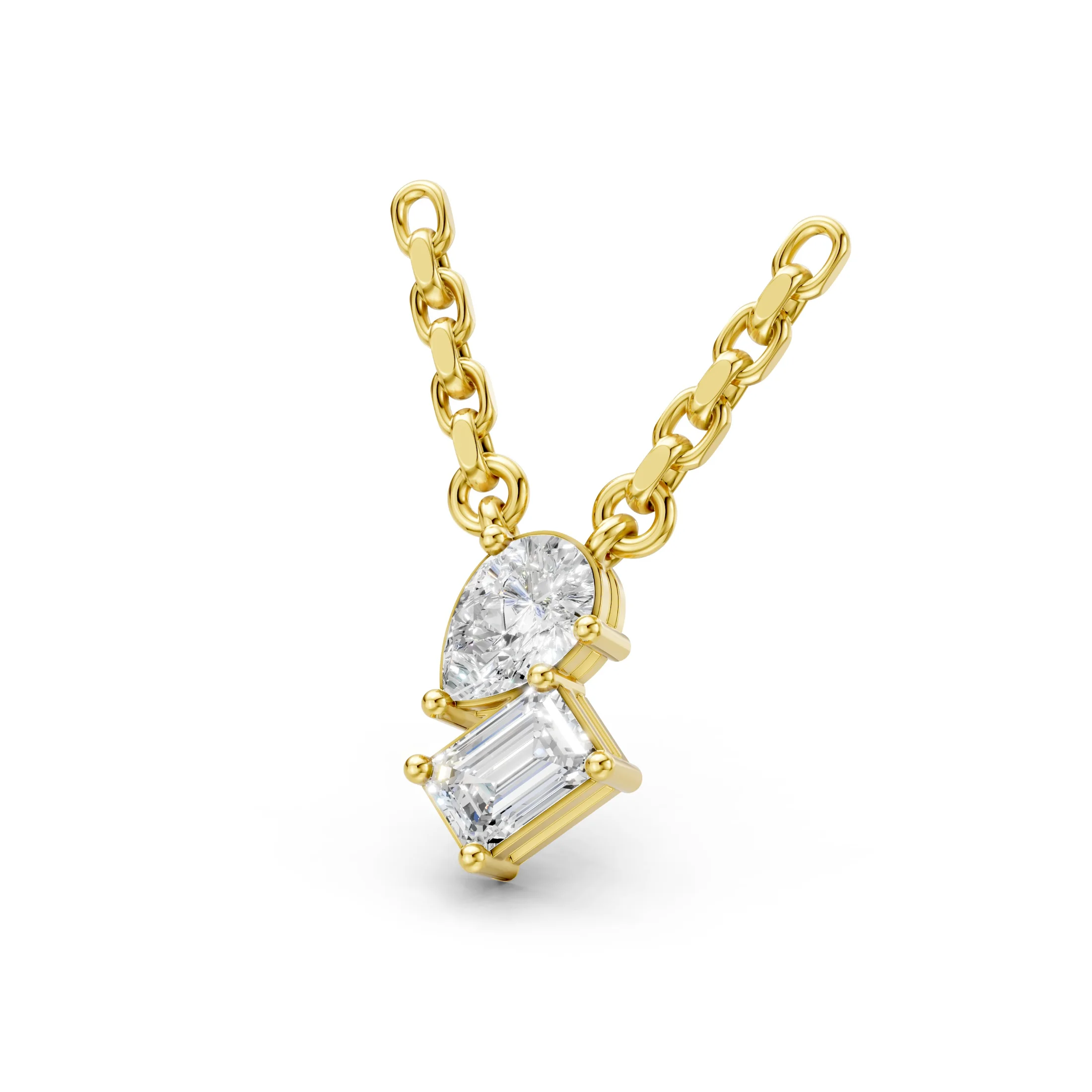 Pear and emerald-cut diamond Toi-Et-Moi necklace with a vertical two-stone arrangement and individual prong settings.