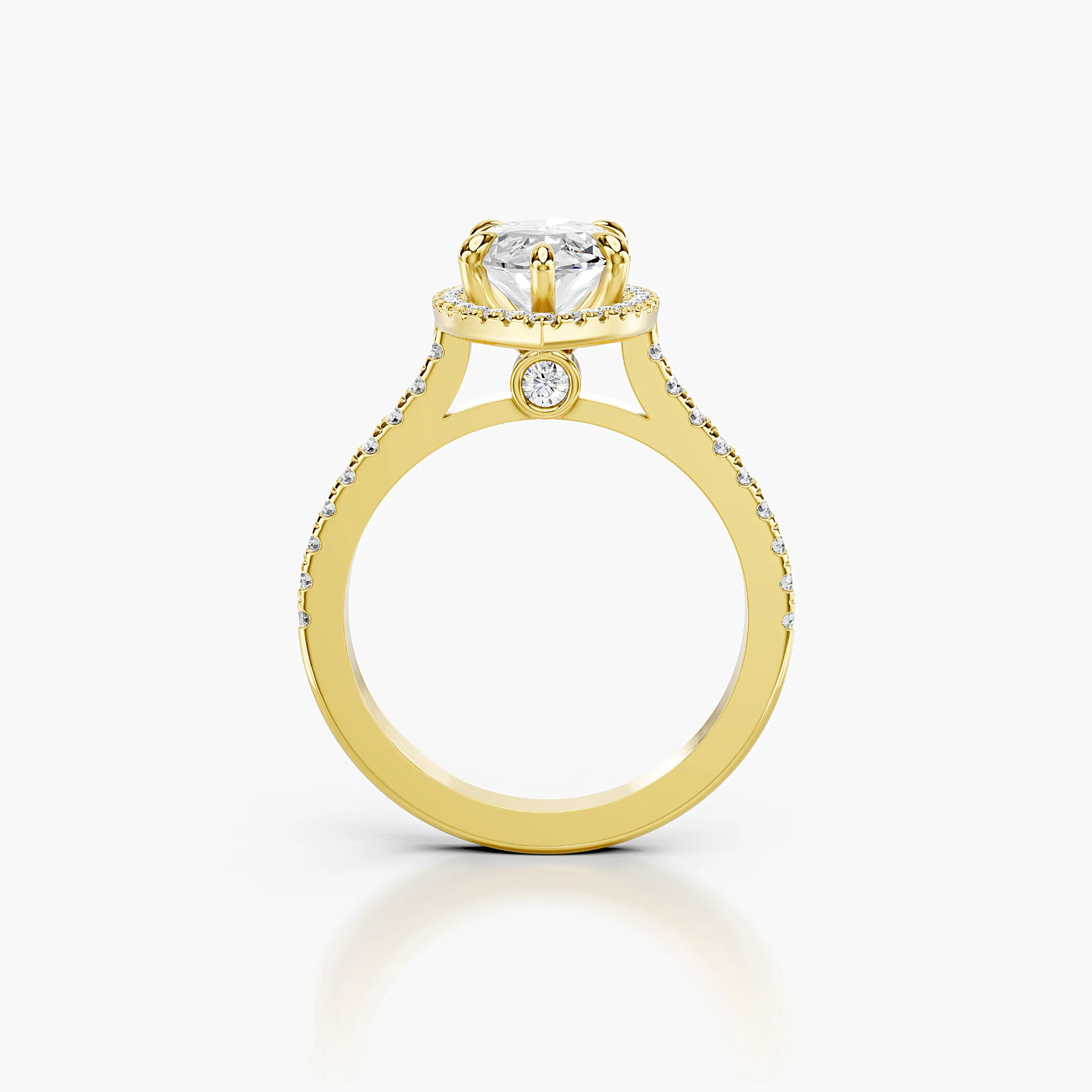 Marquise-cut lab-grown diamond engagement ring with a matching halo and diamond-set band.