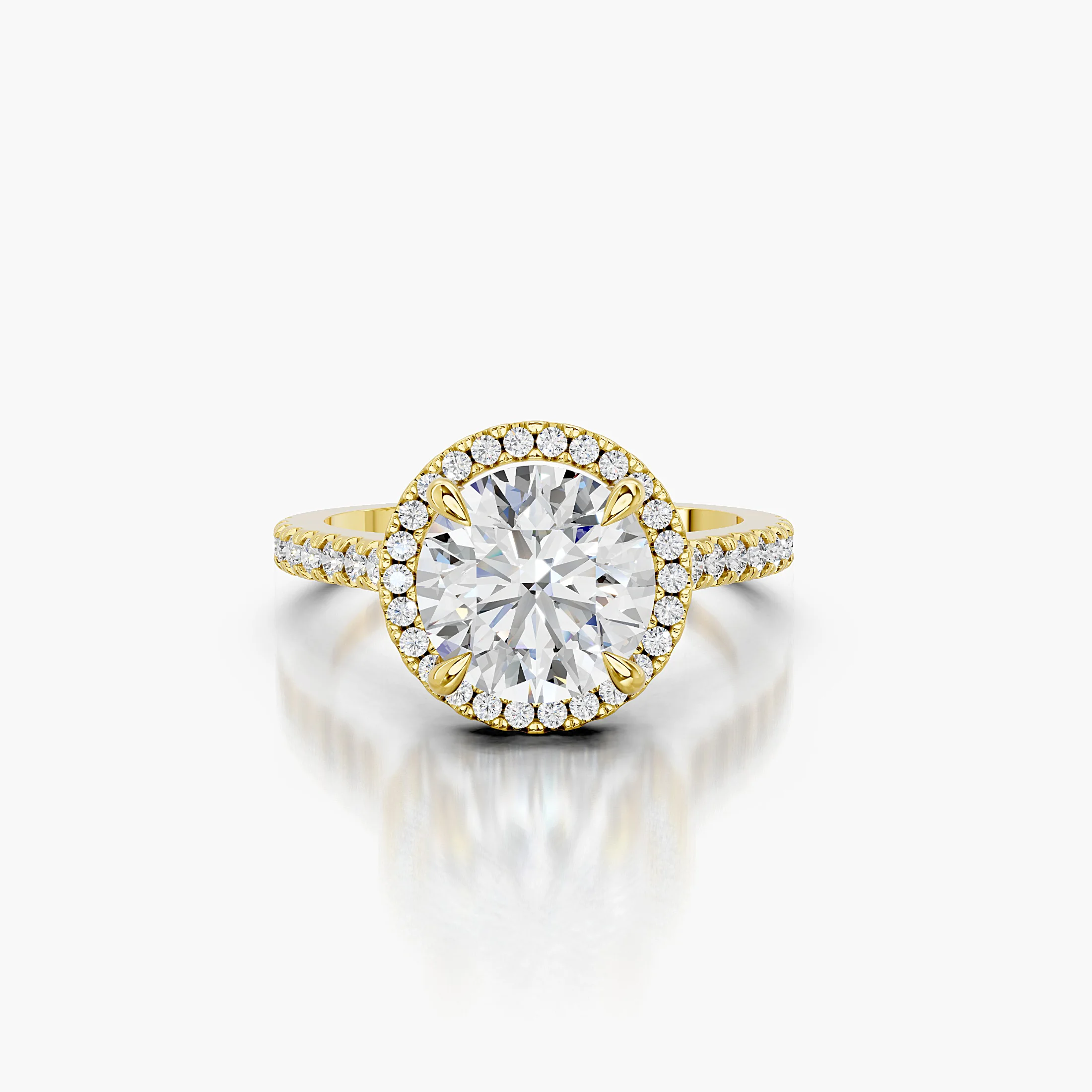 Round-cut lab-grown diamond engagement ring with a circular halo and diamond-set band.
