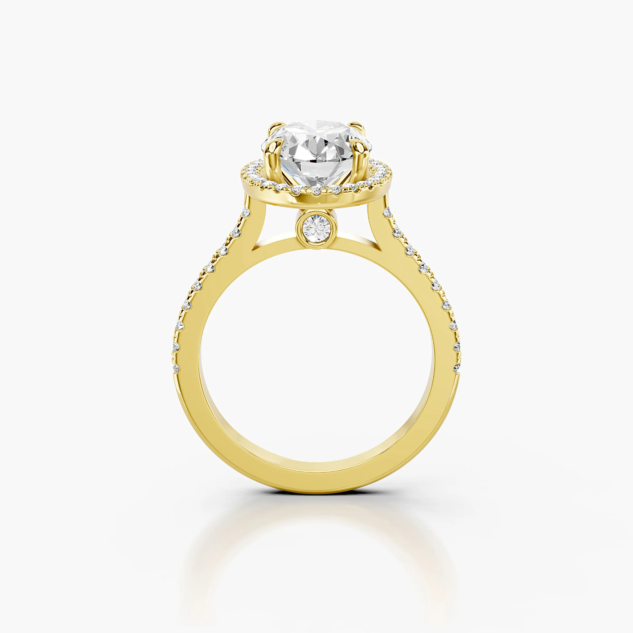 Oval-cut lab-grown diamond engagement ring with a matching halo and diamond-set band.