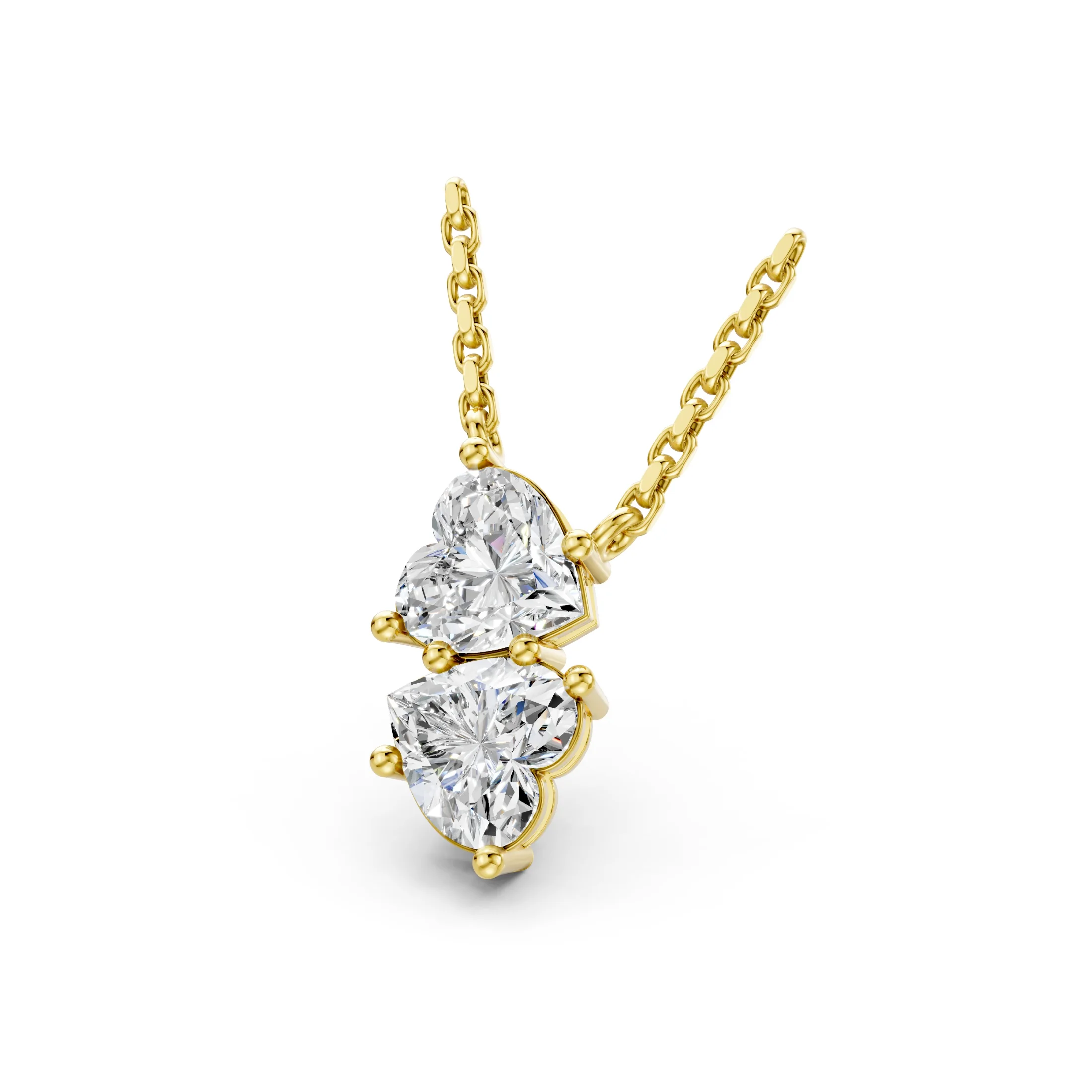Two heart-cut diamond drop necklace with vertically arranged three-prong settings.