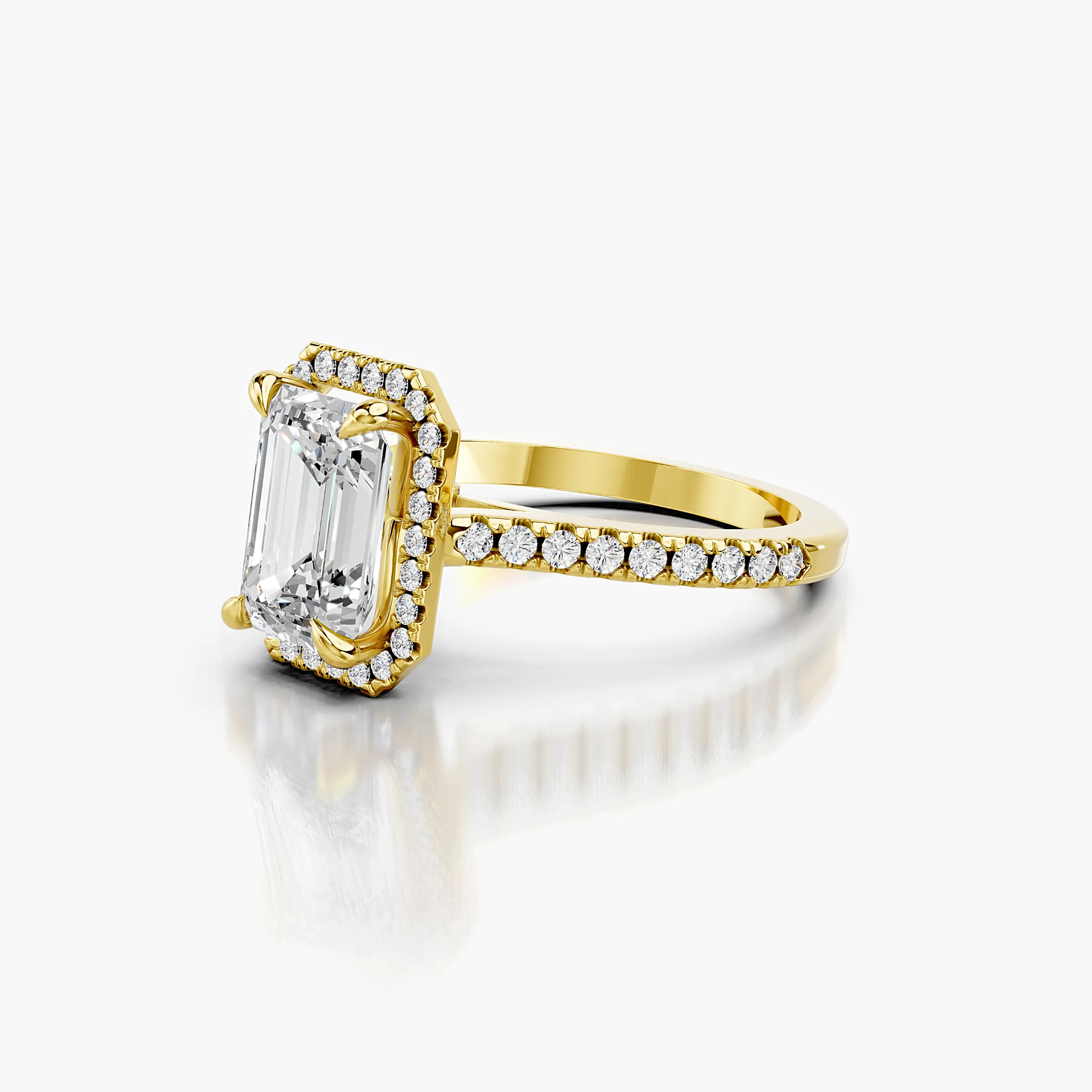 Emerald-cut lab-grown diamond engagement ring with a rectangular halo and diamond-set band.