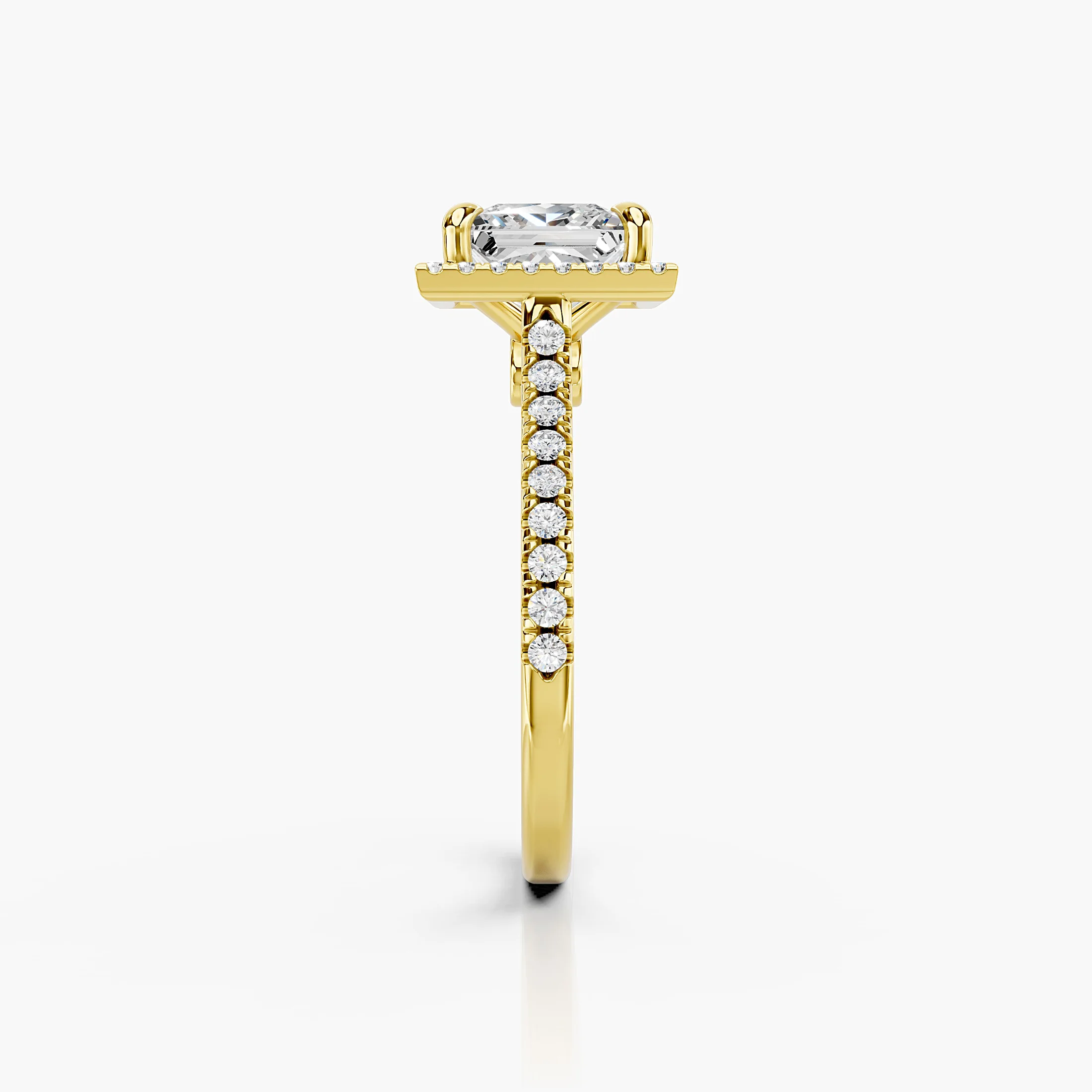 Princess-cut lab-grown diamond engagement ring with a square halo and diamond-set band.