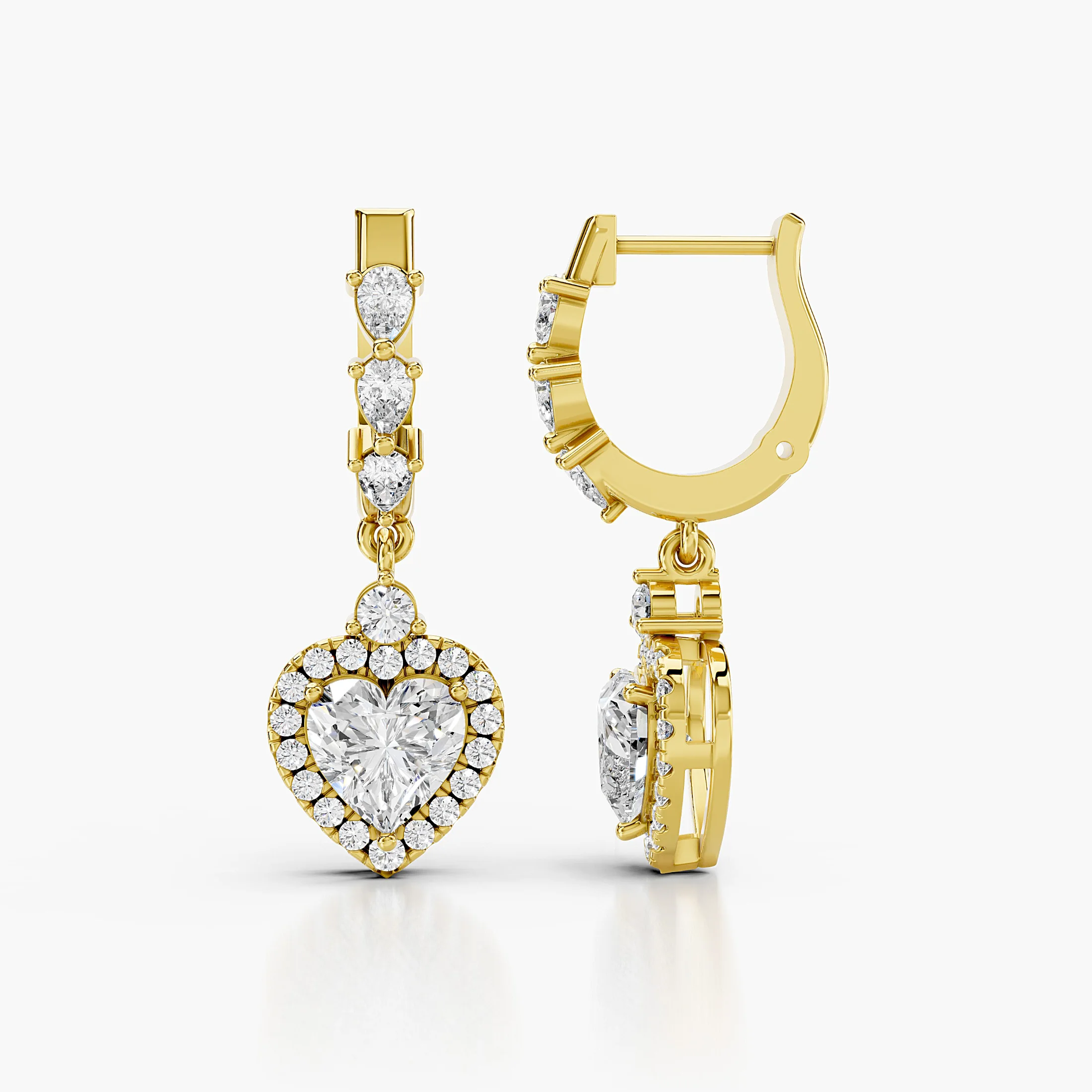 Heart diamond halo drop earrings with graduated pear and round diamond links.