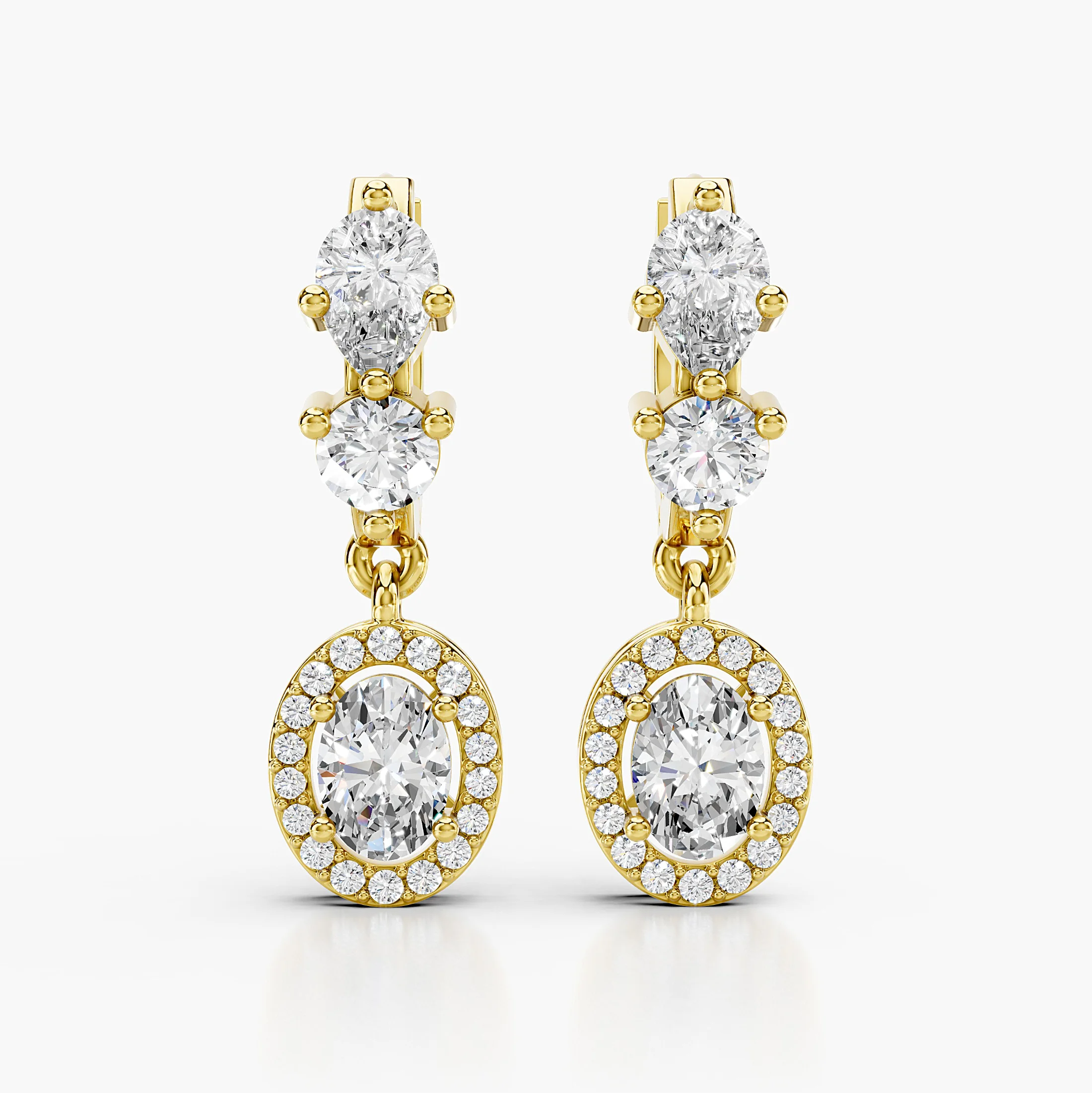 Pair of multi-shape diamond drop earrings with oval halo pendants and articulated hoop tops.