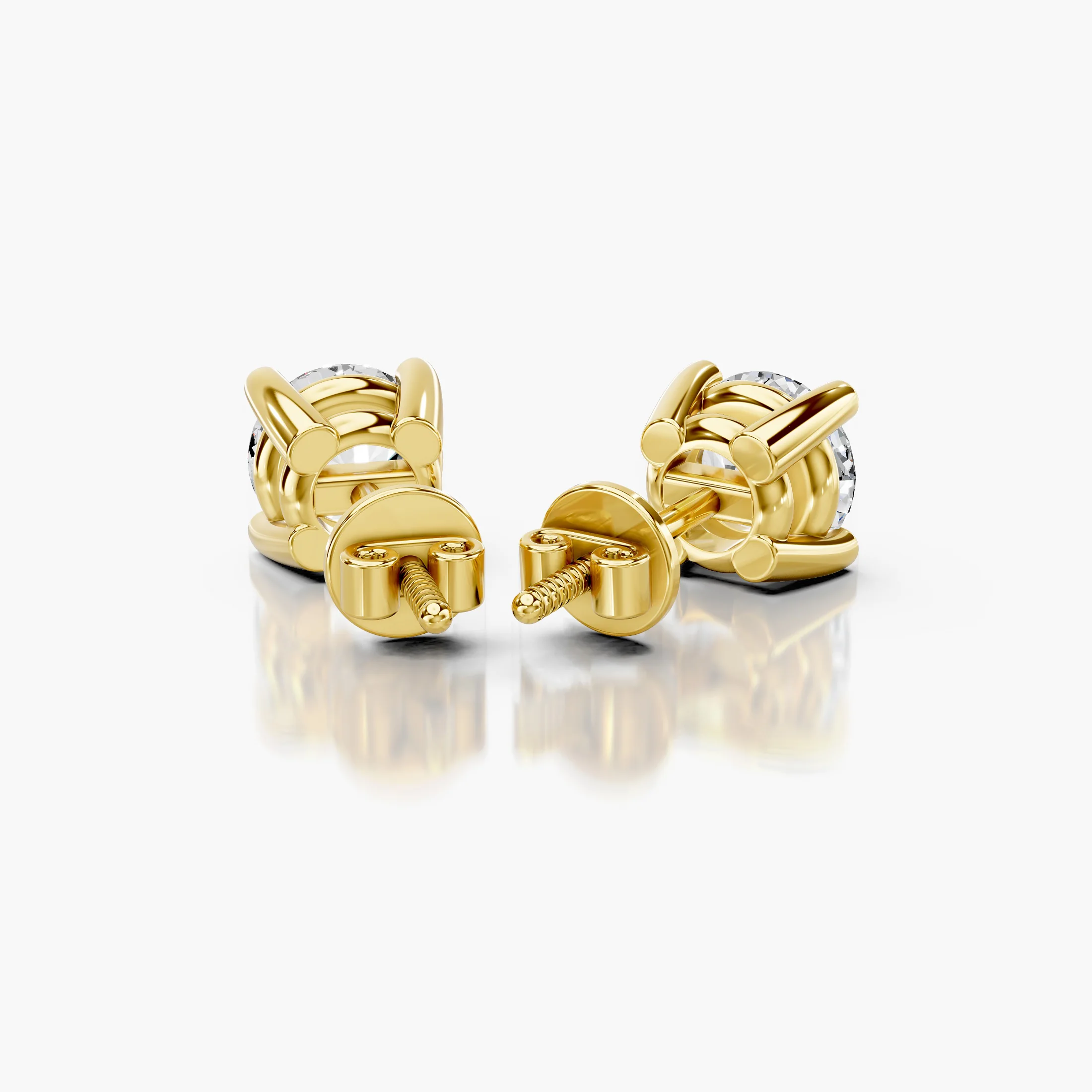 Round diamond solitaire stud earrings with four-prong basket settings and screw-back closures