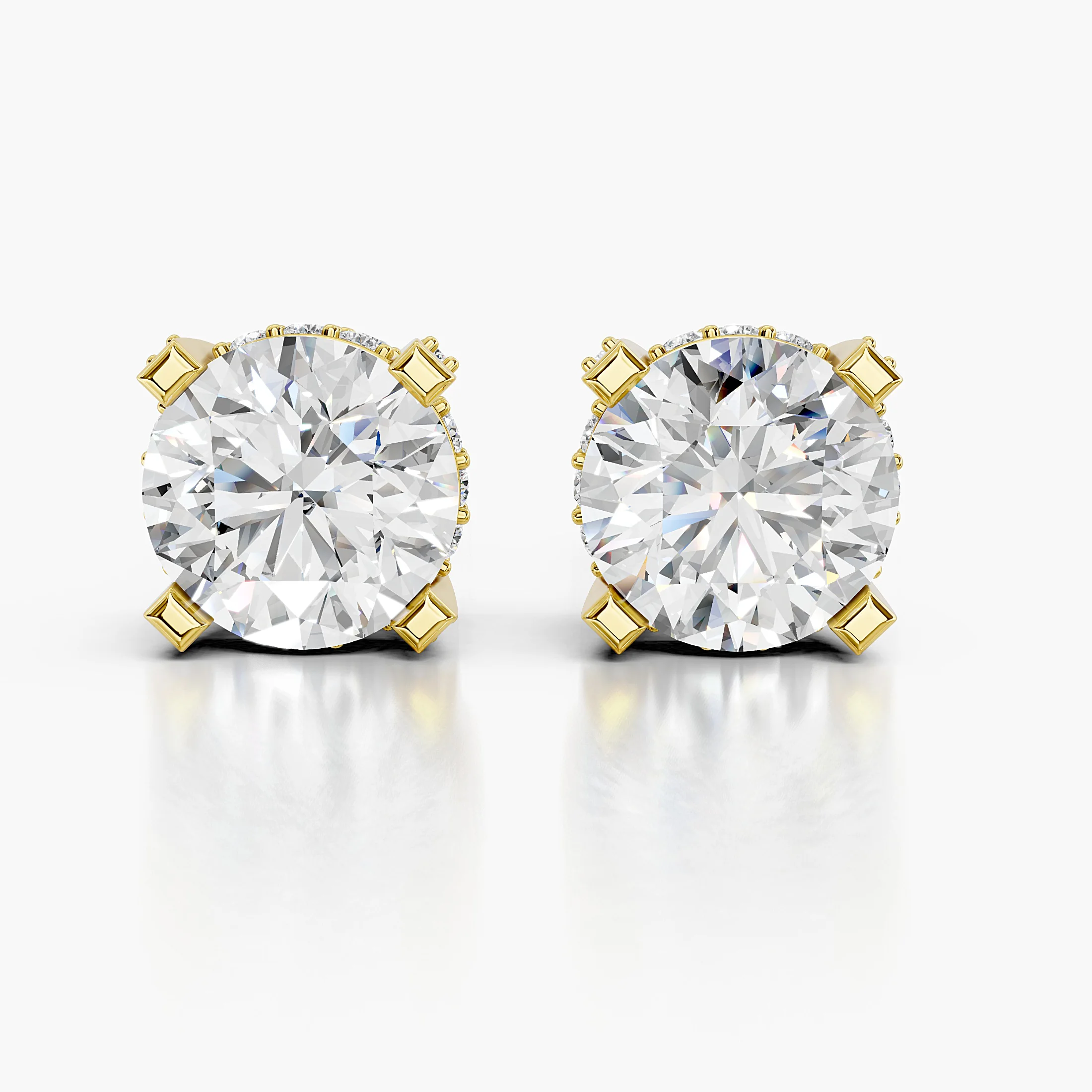 Round diamond stud earrings with square-tipped prongs and sparkling double hidden halos.