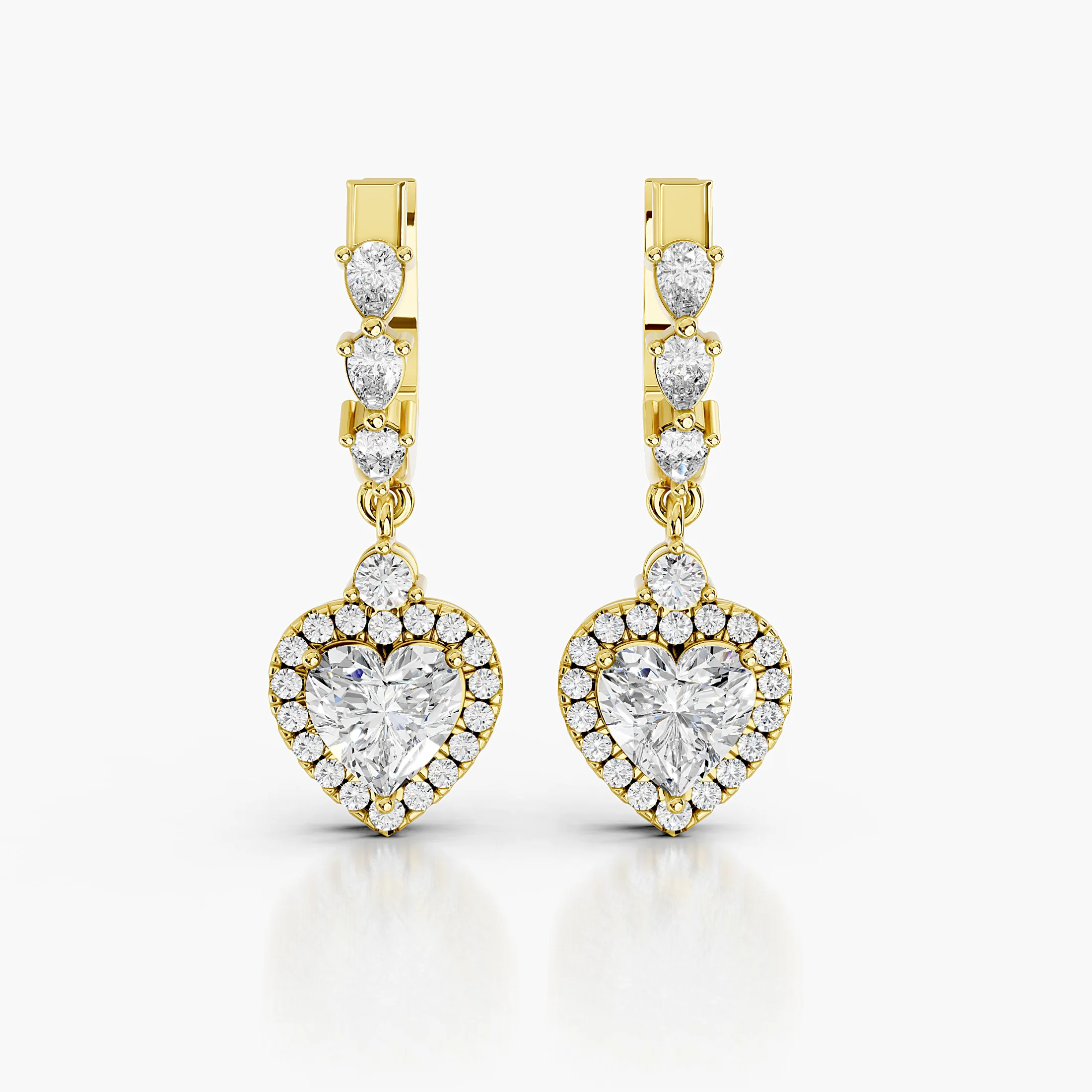 Heart diamond halo drop earrings with graduated pear and round diamond links.