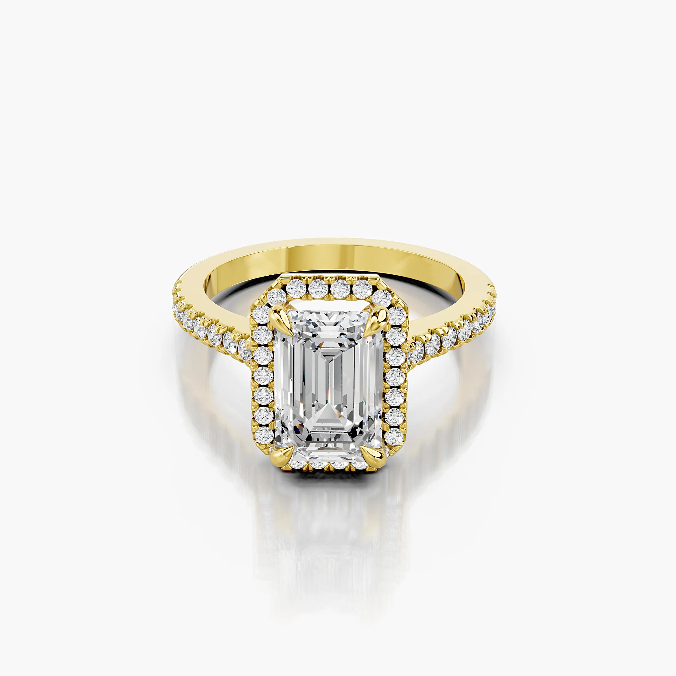 Emerald-cut lab-grown diamond engagement ring with a rectangular halo and diamond-set band.
