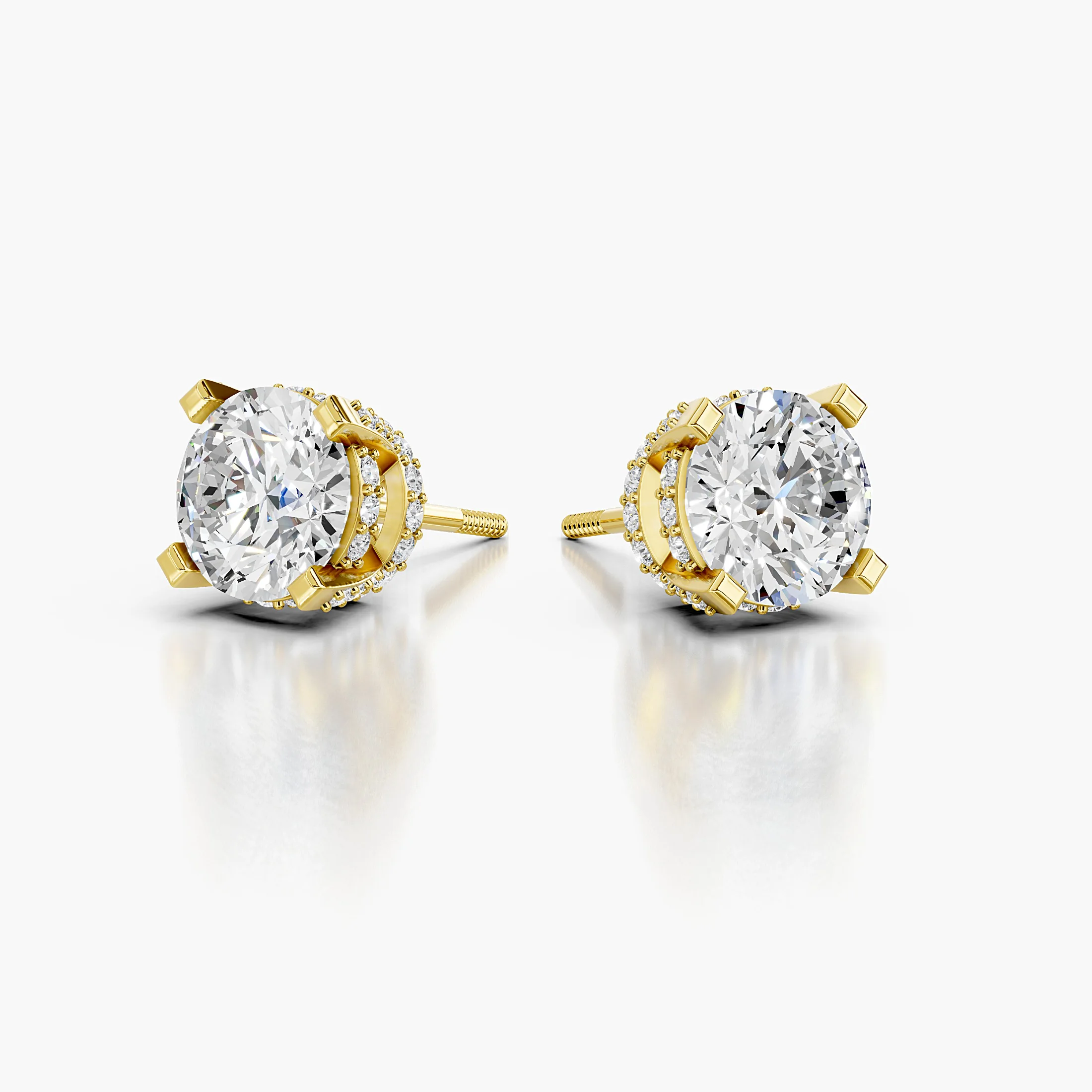 Round diamond stud earrings with square-tipped prongs and sparkling double hidden halos.