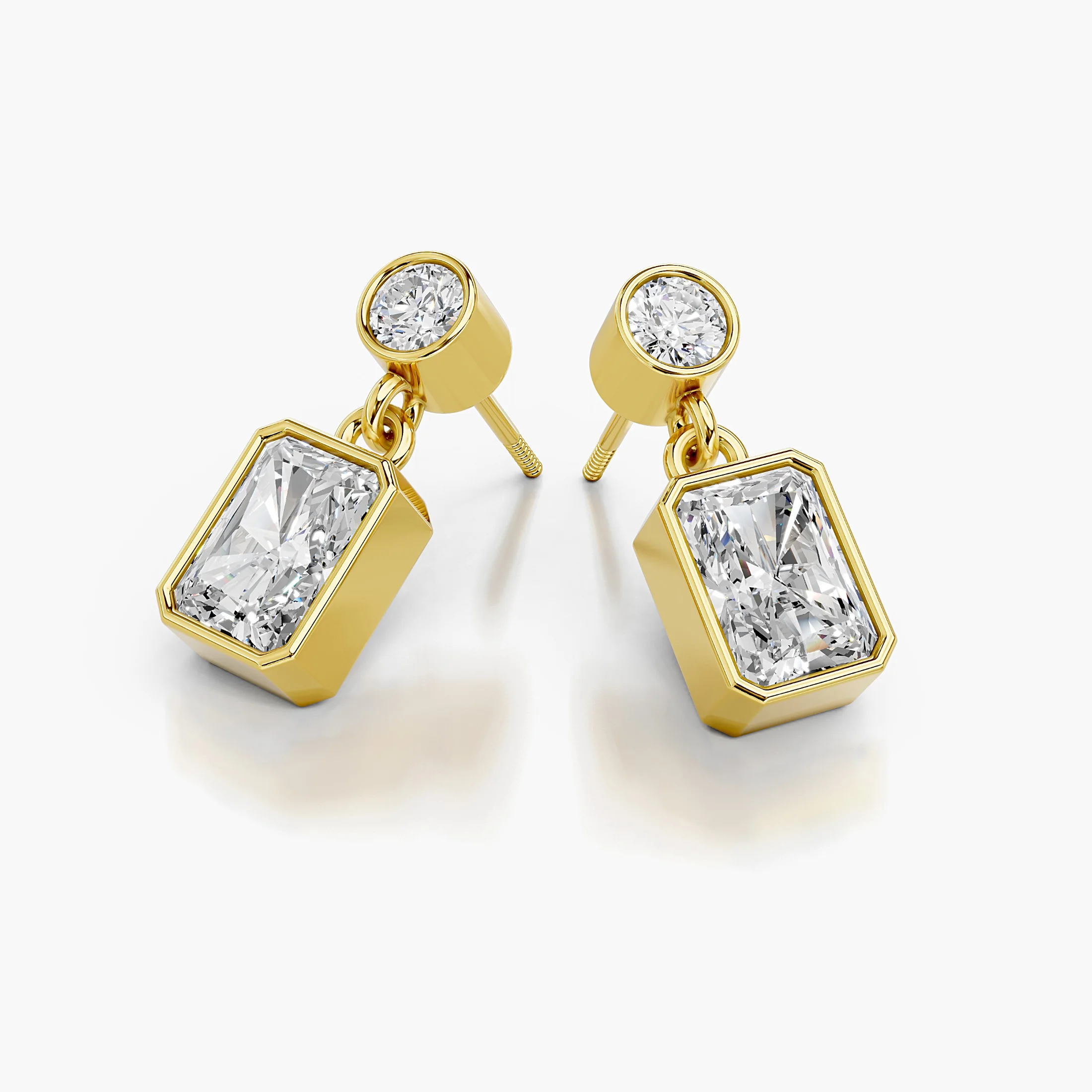 Radiant-cut and round diamond bezel drop earrings with articulated connectors.