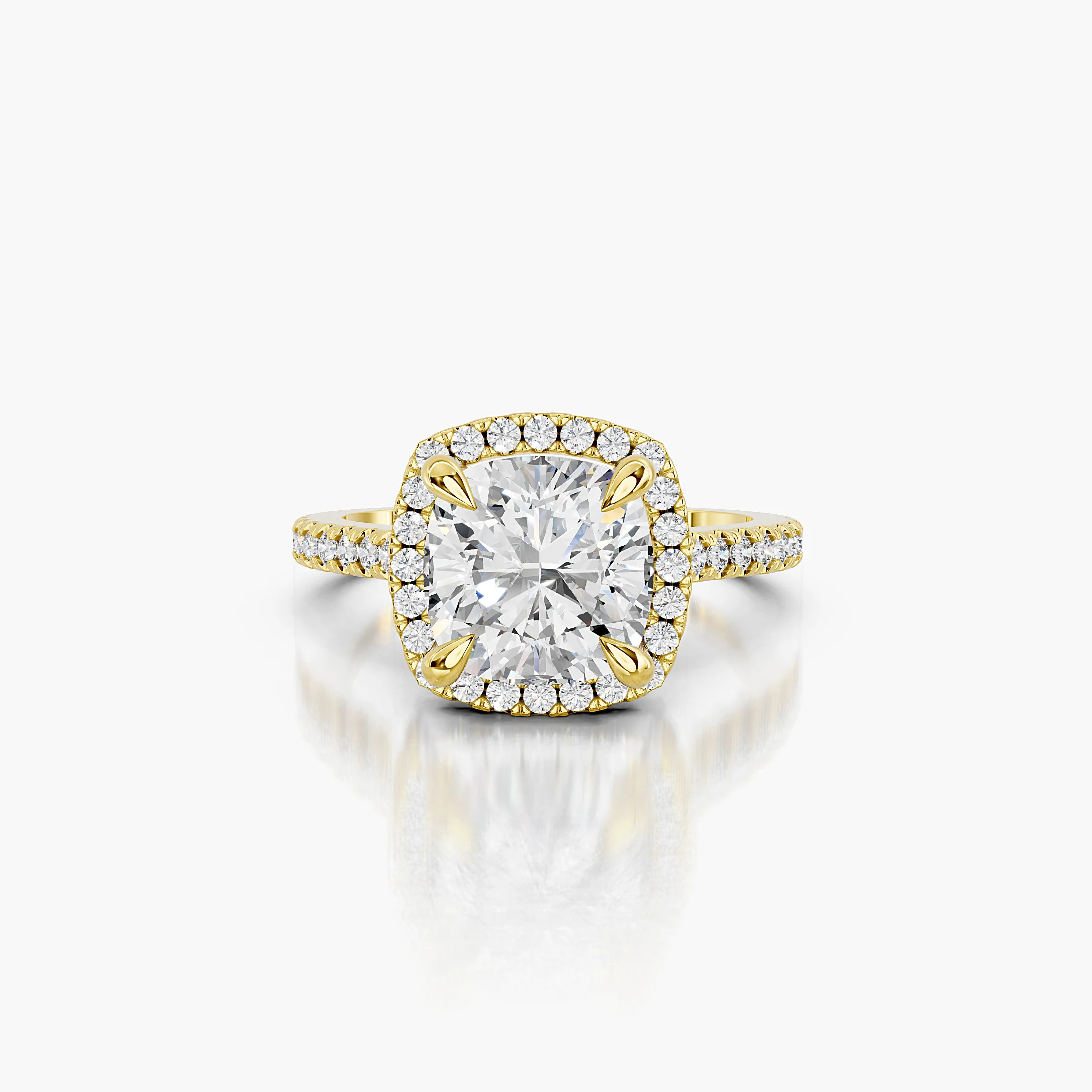 Cushion-cut lab-grown diamond engagement ring with a squared halo and diamond-set band.