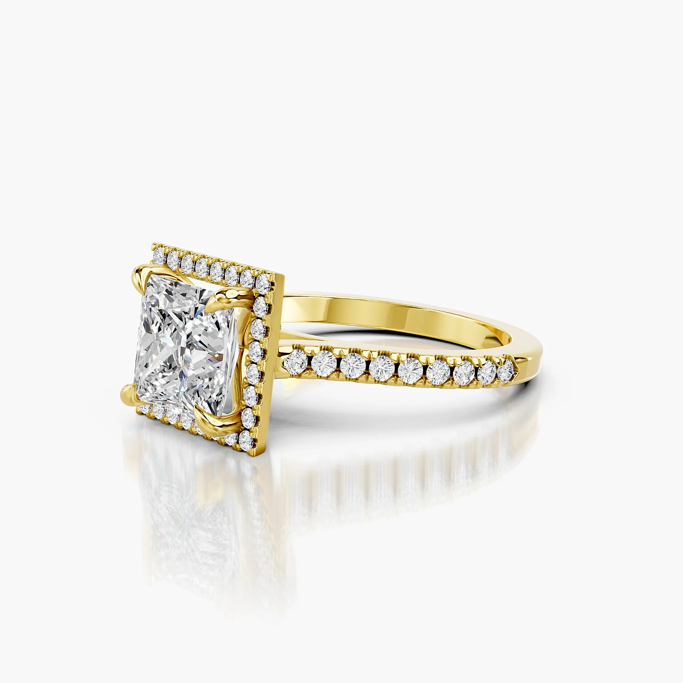 Princess-cut lab-grown diamond engagement ring with a square halo and diamond-set band.