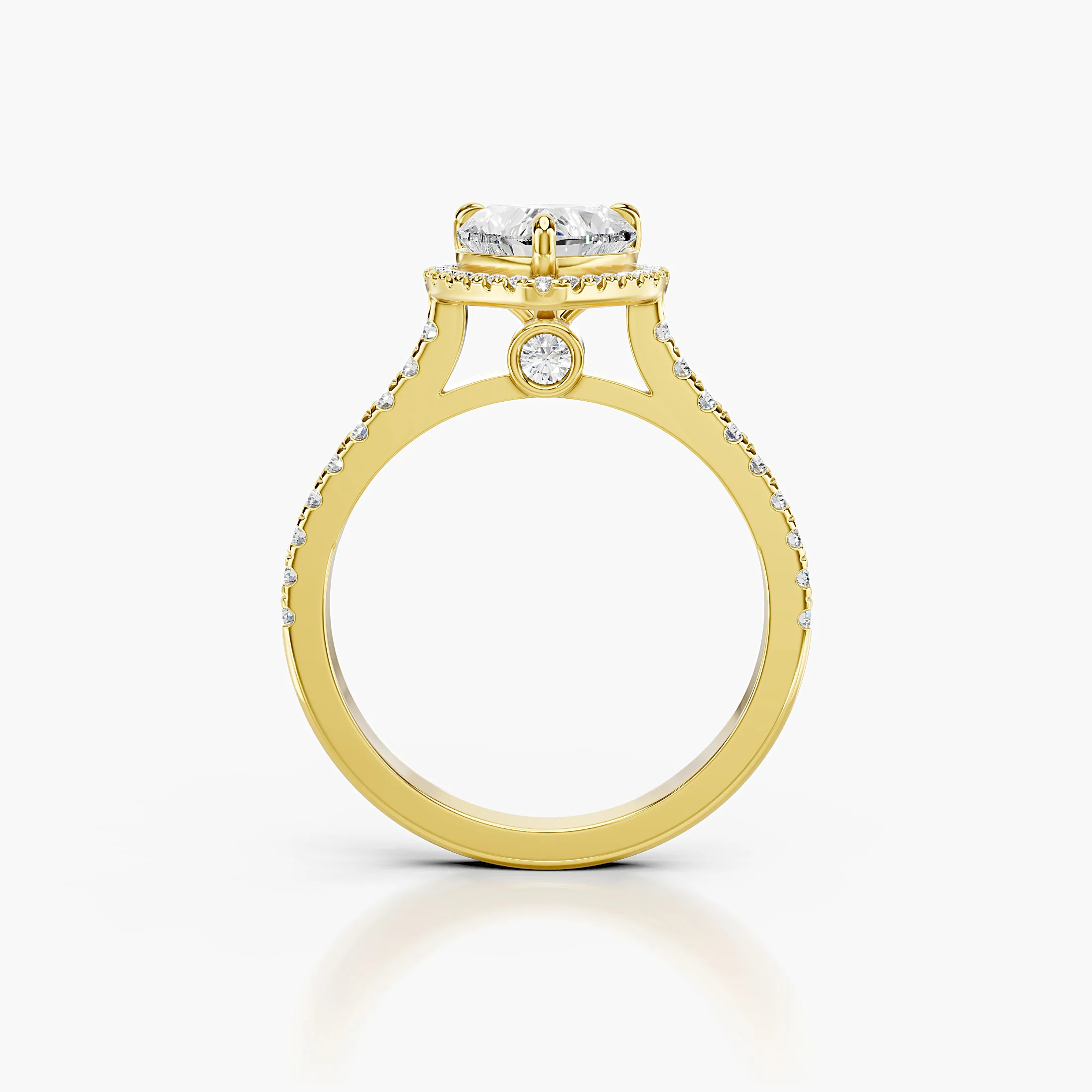 Heart-cut lab-grown diamond engagement ring with a matching halo and diamond-set band.