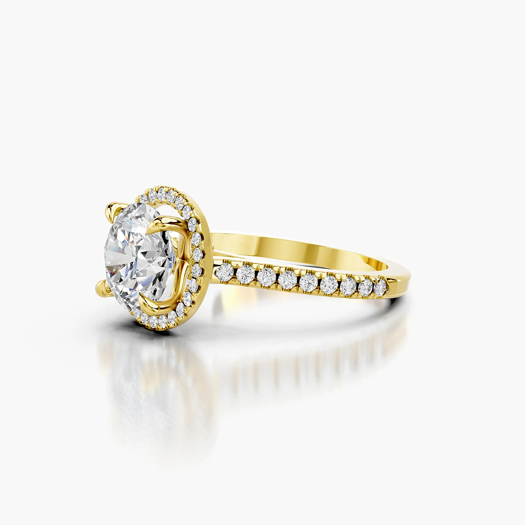 Round-cut lab-grown diamond engagement ring with a circular halo and diamond-set band.