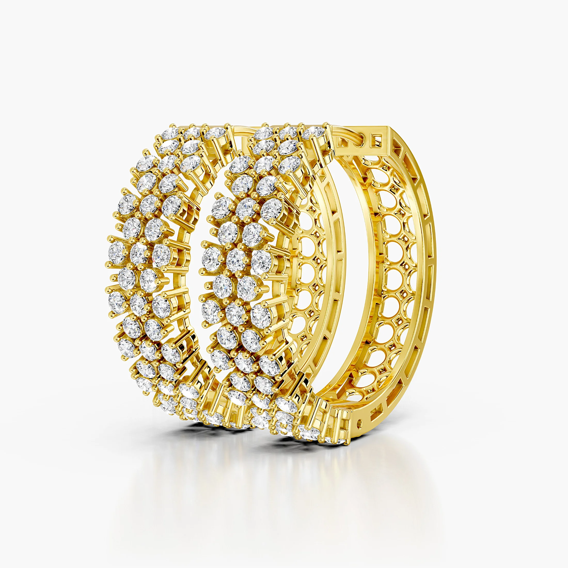 Pair of broad diamond hoop earrings featuring three continuous rows of round stones.