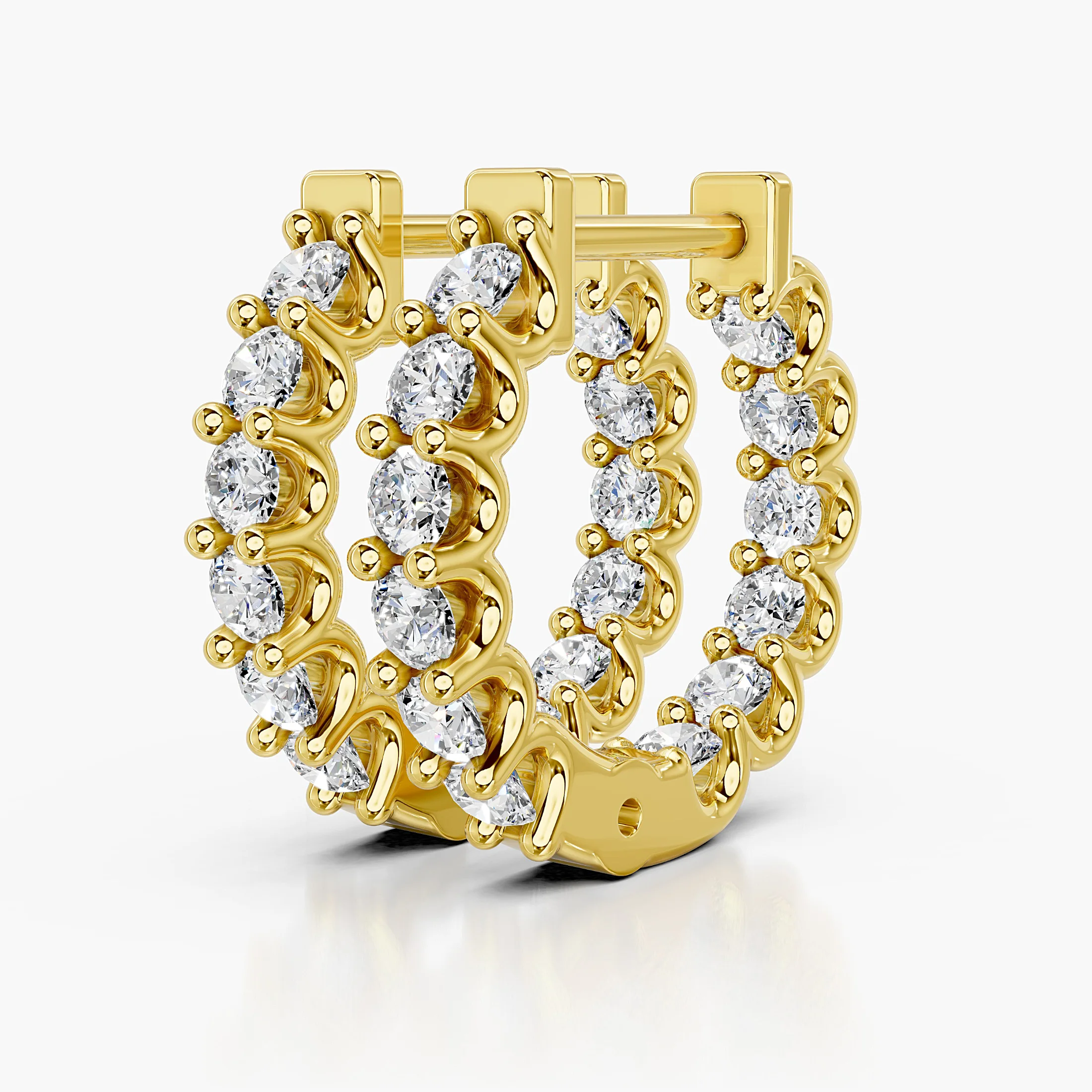 Round diamond classic hoop earrings with shared-prong settings.