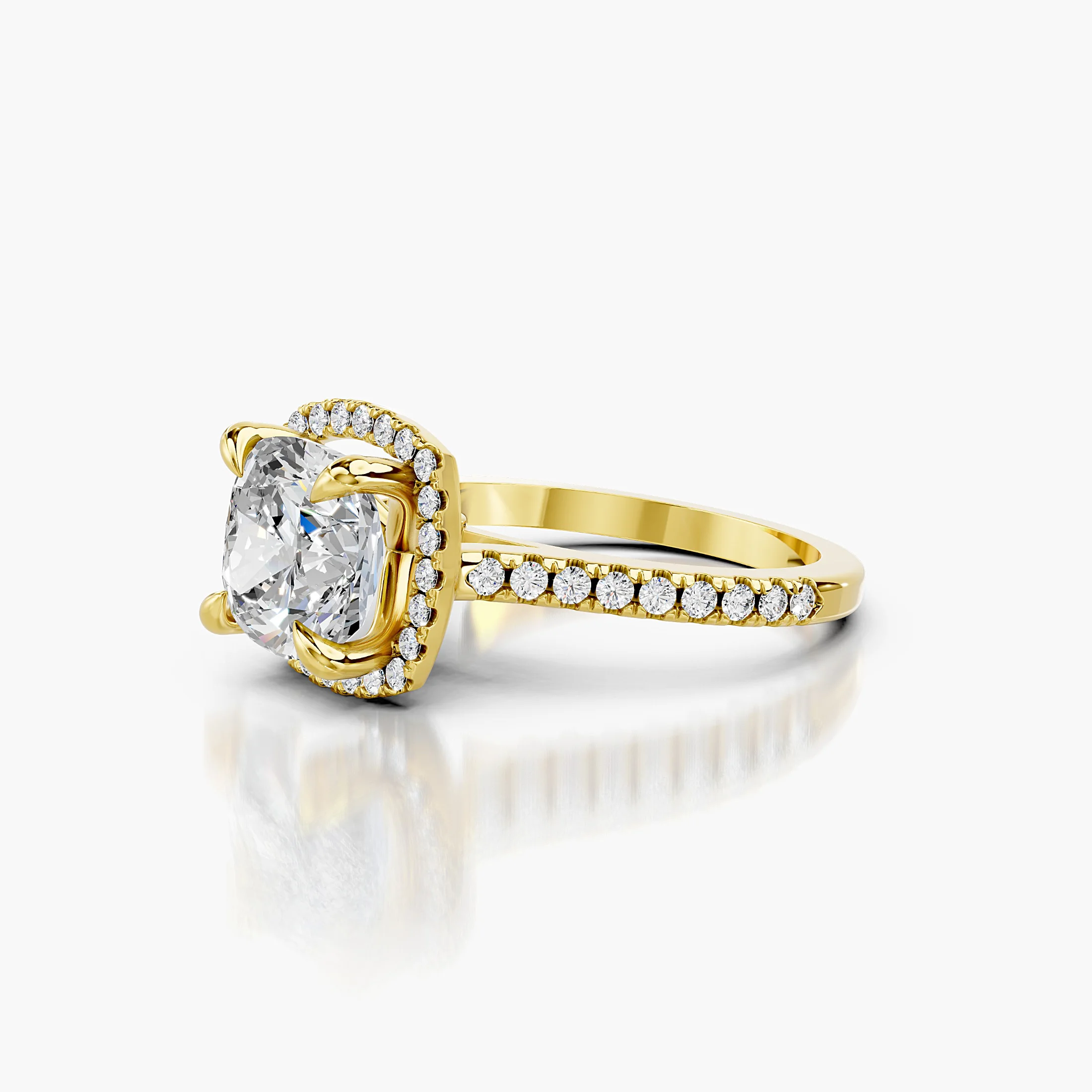 Cushion-cut lab-grown diamond engagement ring with a squared halo and diamond-set band.