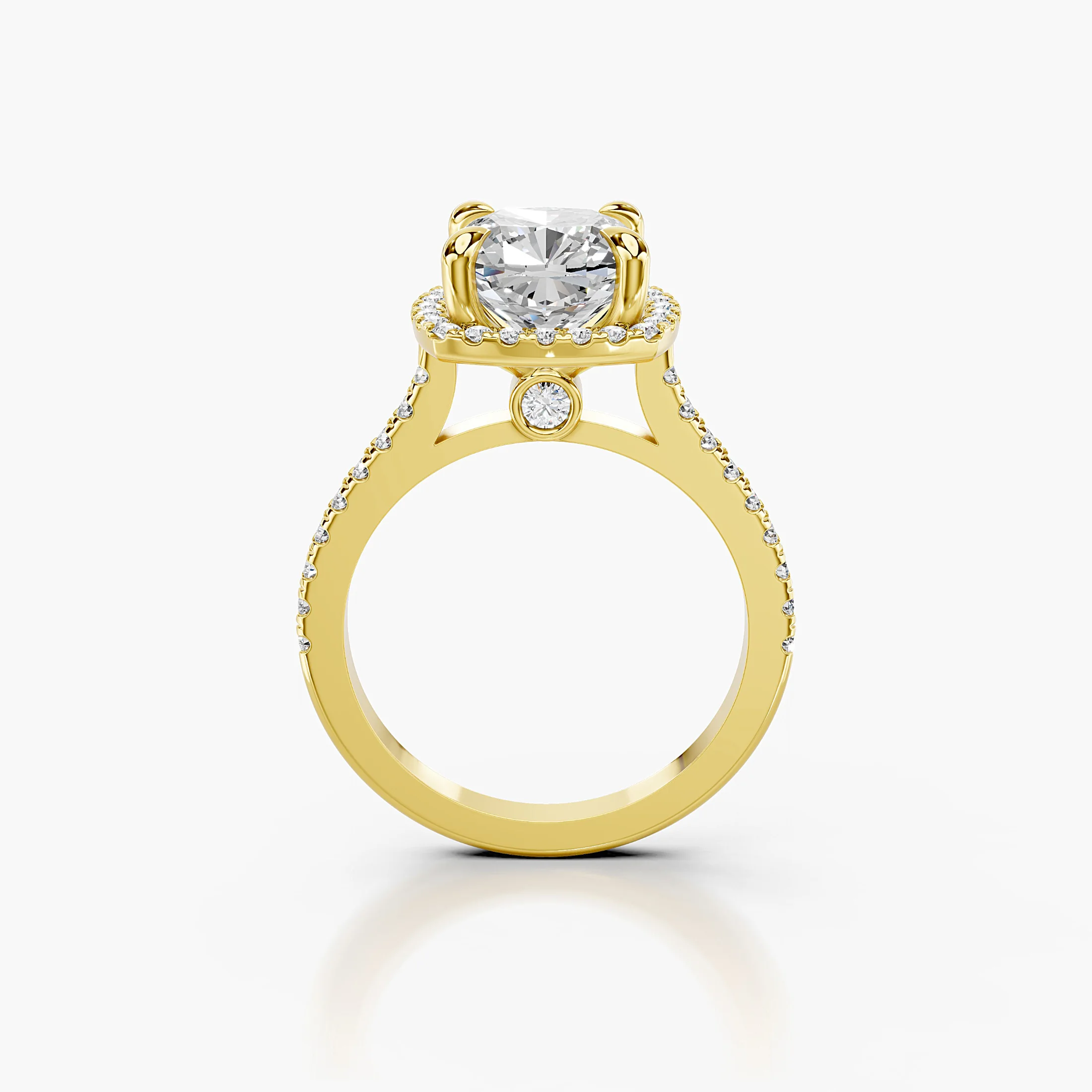 Cushion-cut lab-grown diamond engagement ring with a squared halo and diamond-set band.