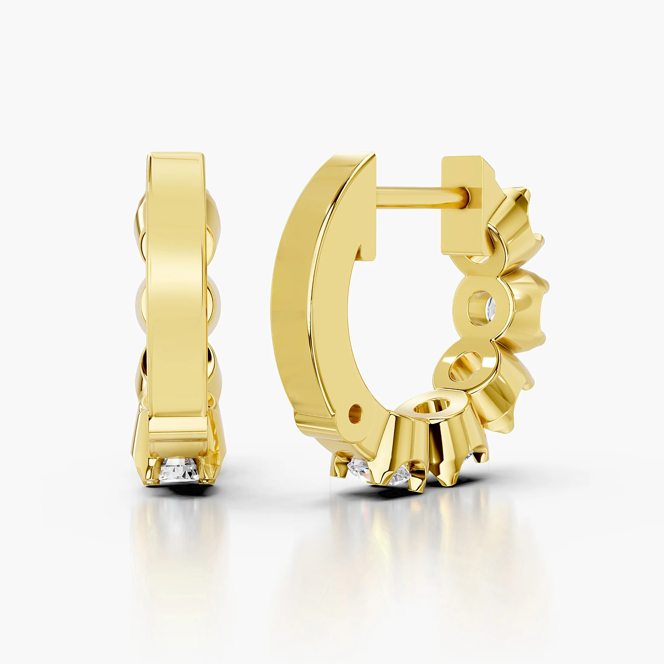 Round diamond five-stone huggie earrings with four-prong settings.