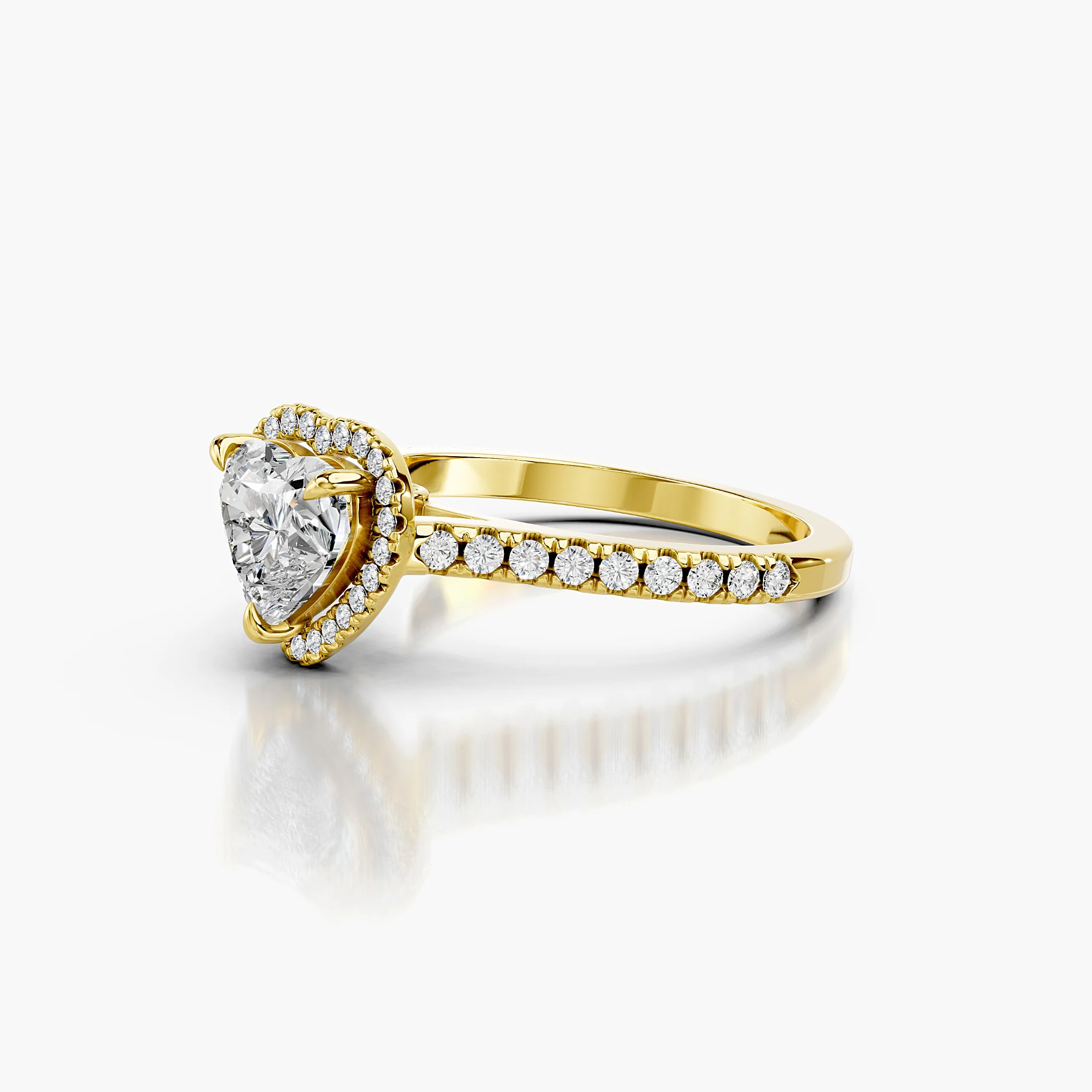 Heart-cut lab-grown diamond engagement ring with a matching halo and diamond-set band.