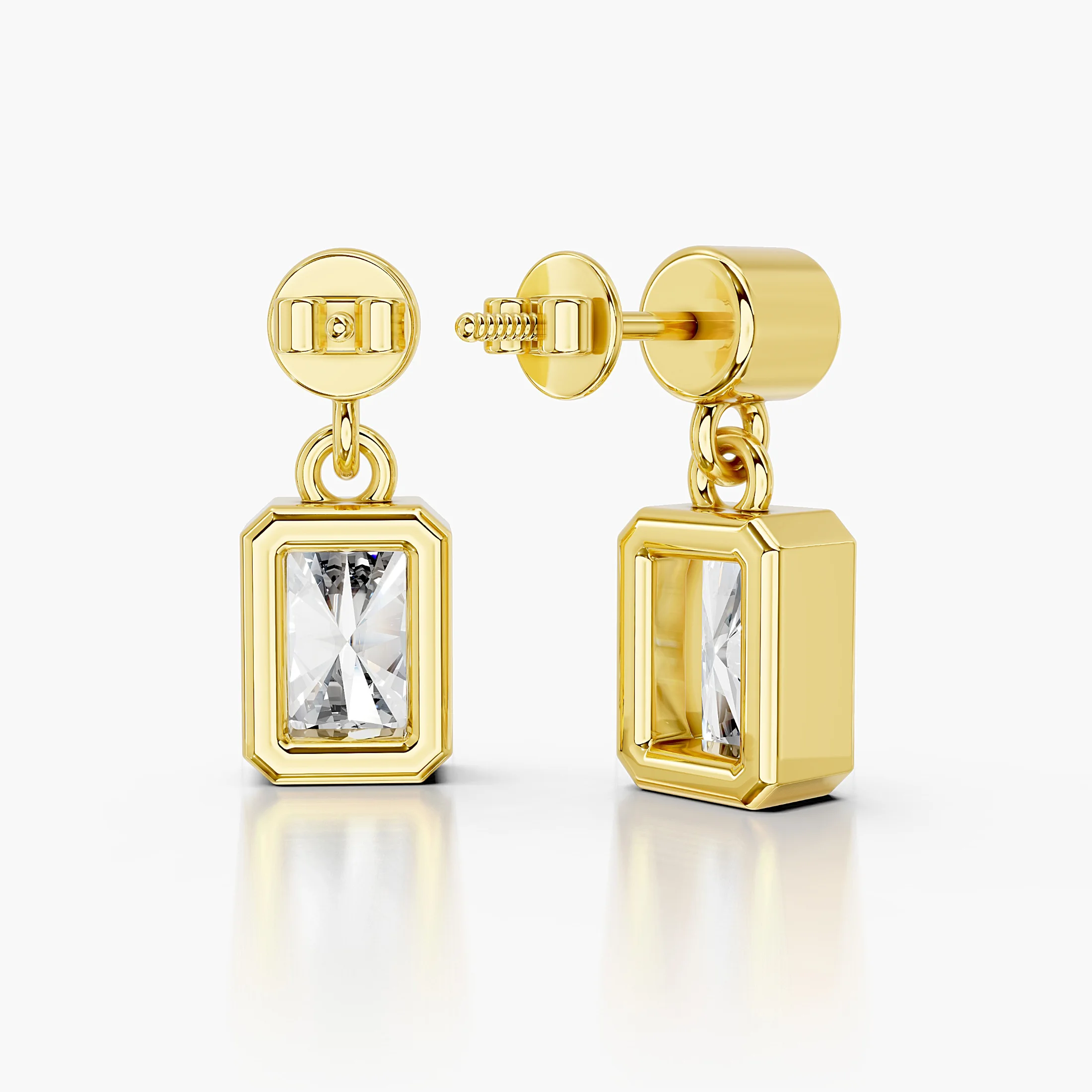 Radiant-cut and round diamond bezel drop earrings with articulated connectors.