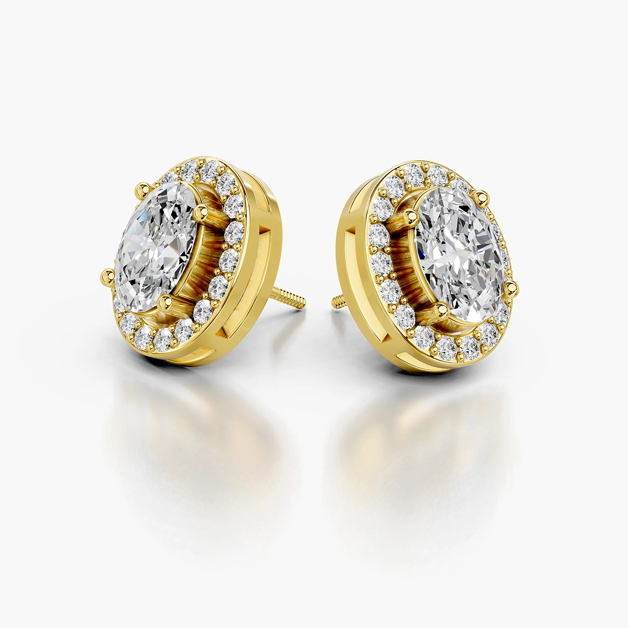 Oval diamond stud earrings with continuous round diamond halos and screw-back closures