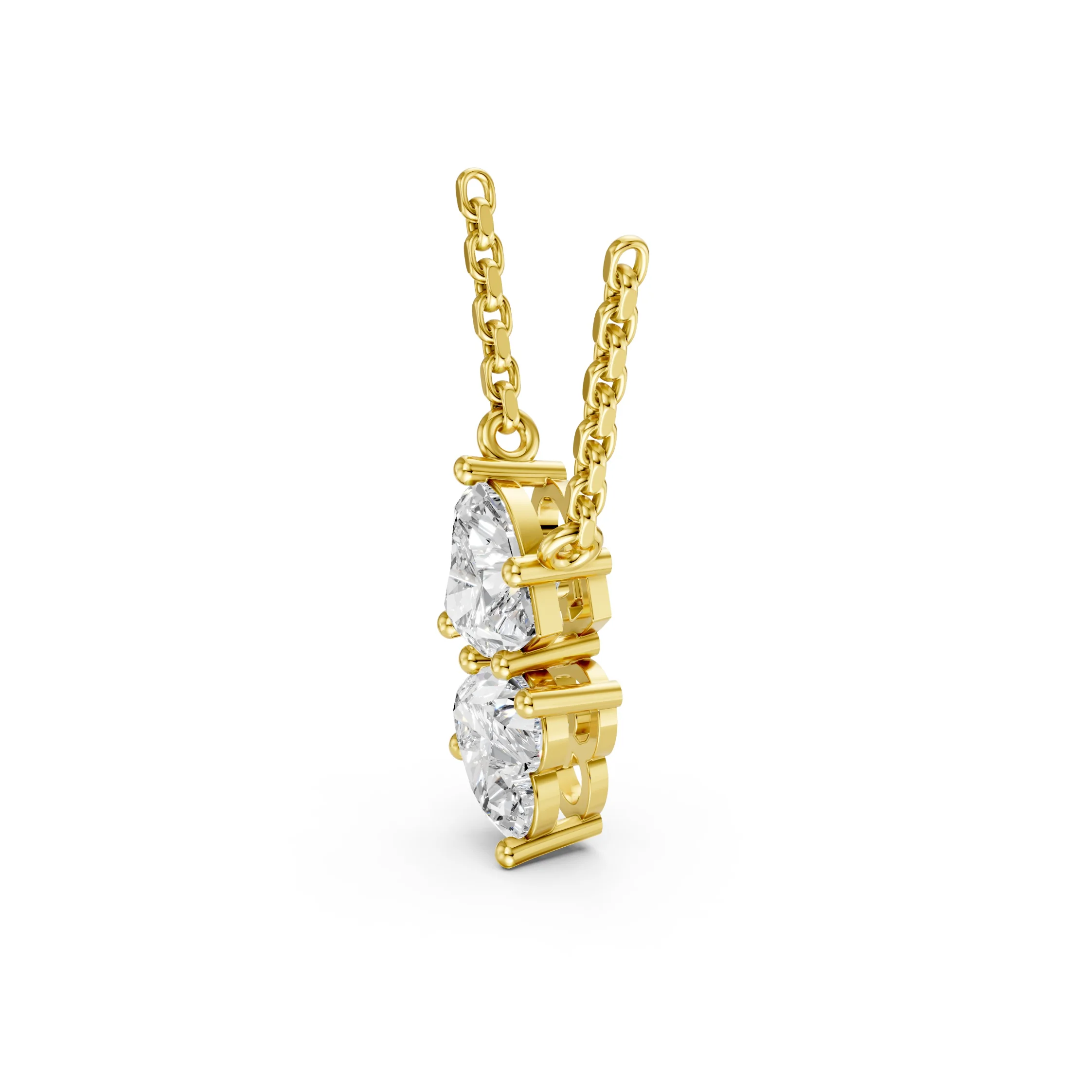 Two heart-cut diamond drop necklace with vertically arranged three-prong settings.