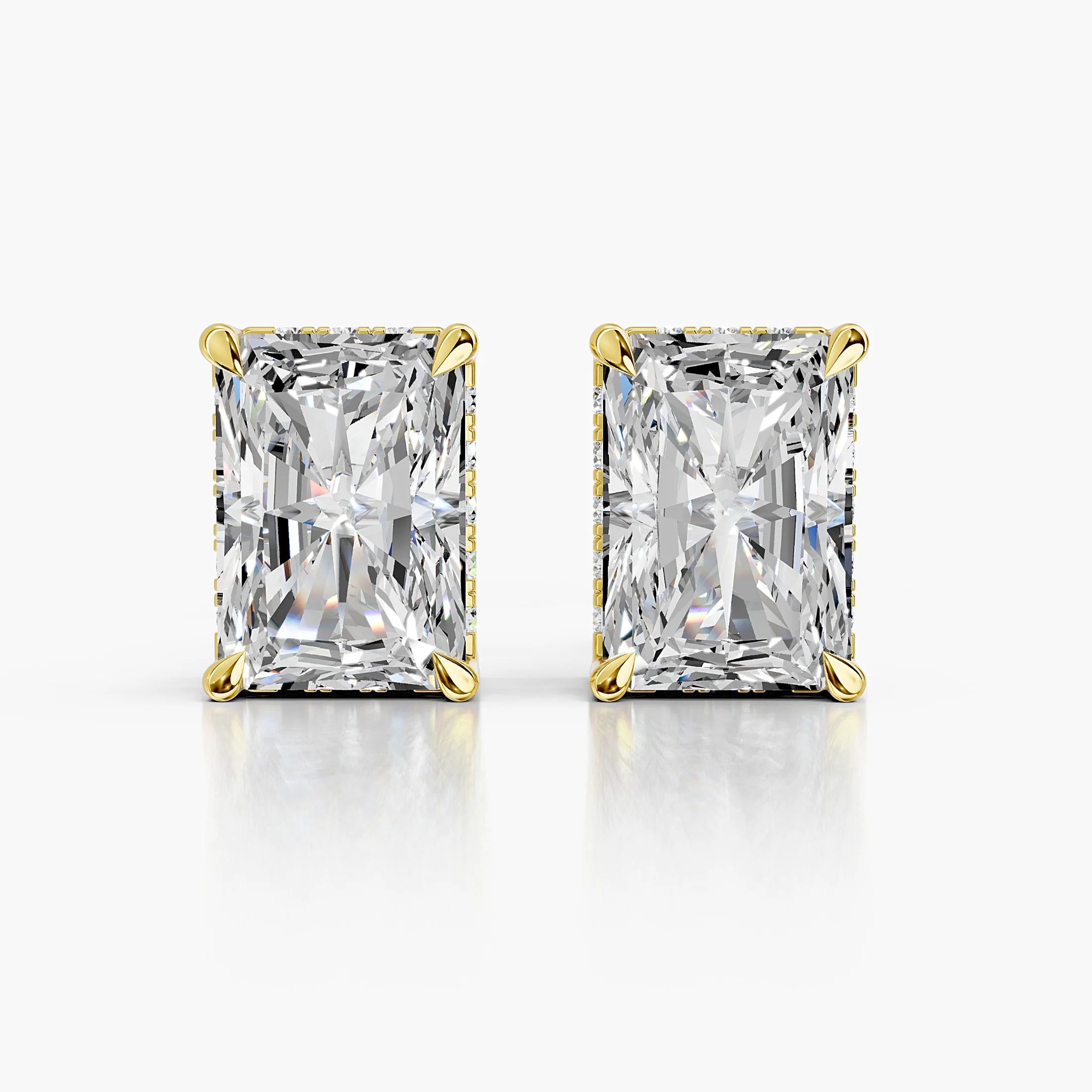 Radiant-cut lab-grown diamond stud earrings with sculpted prongs and diamond-accented side galleries.