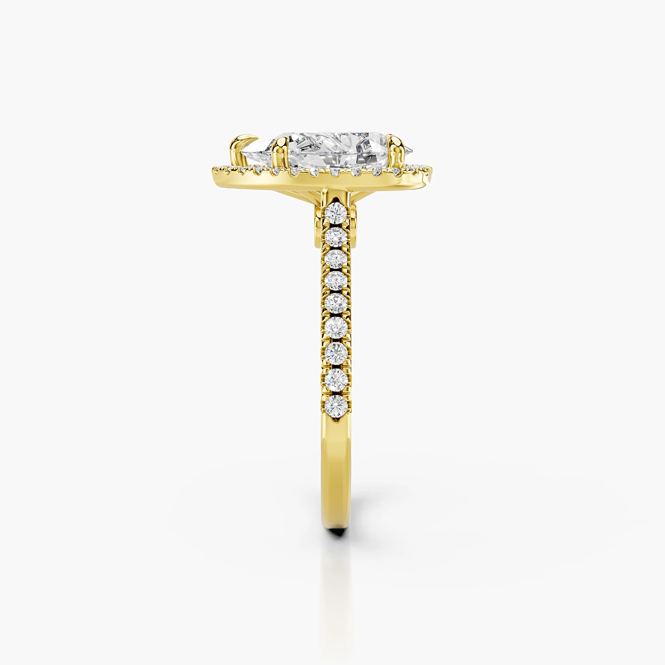 Pear-cut lab-grown diamond engagement ring with a matching halo and diamond-set band.
