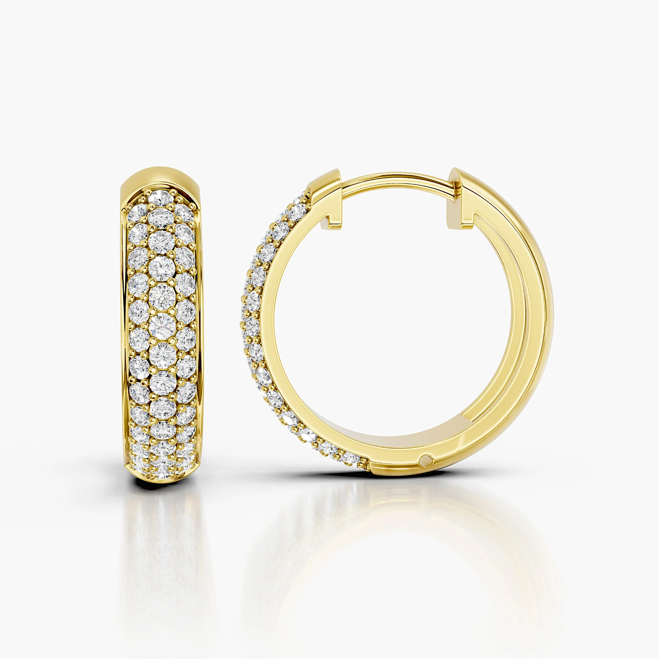 Wide diamond hoop earrings with three rows of round stones and polished borders.