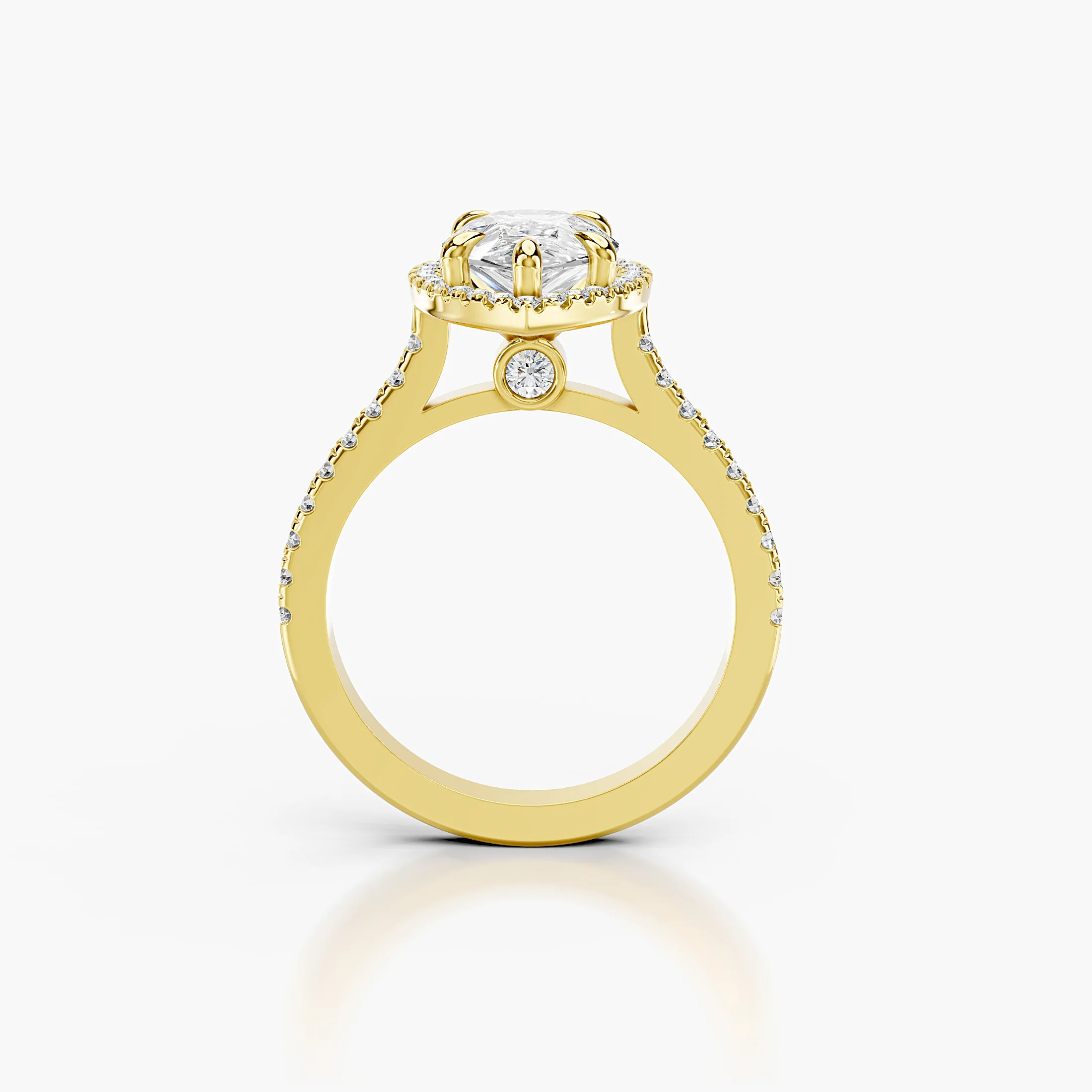 Pear-cut lab-grown diamond engagement ring with a matching halo and diamond-set band.
