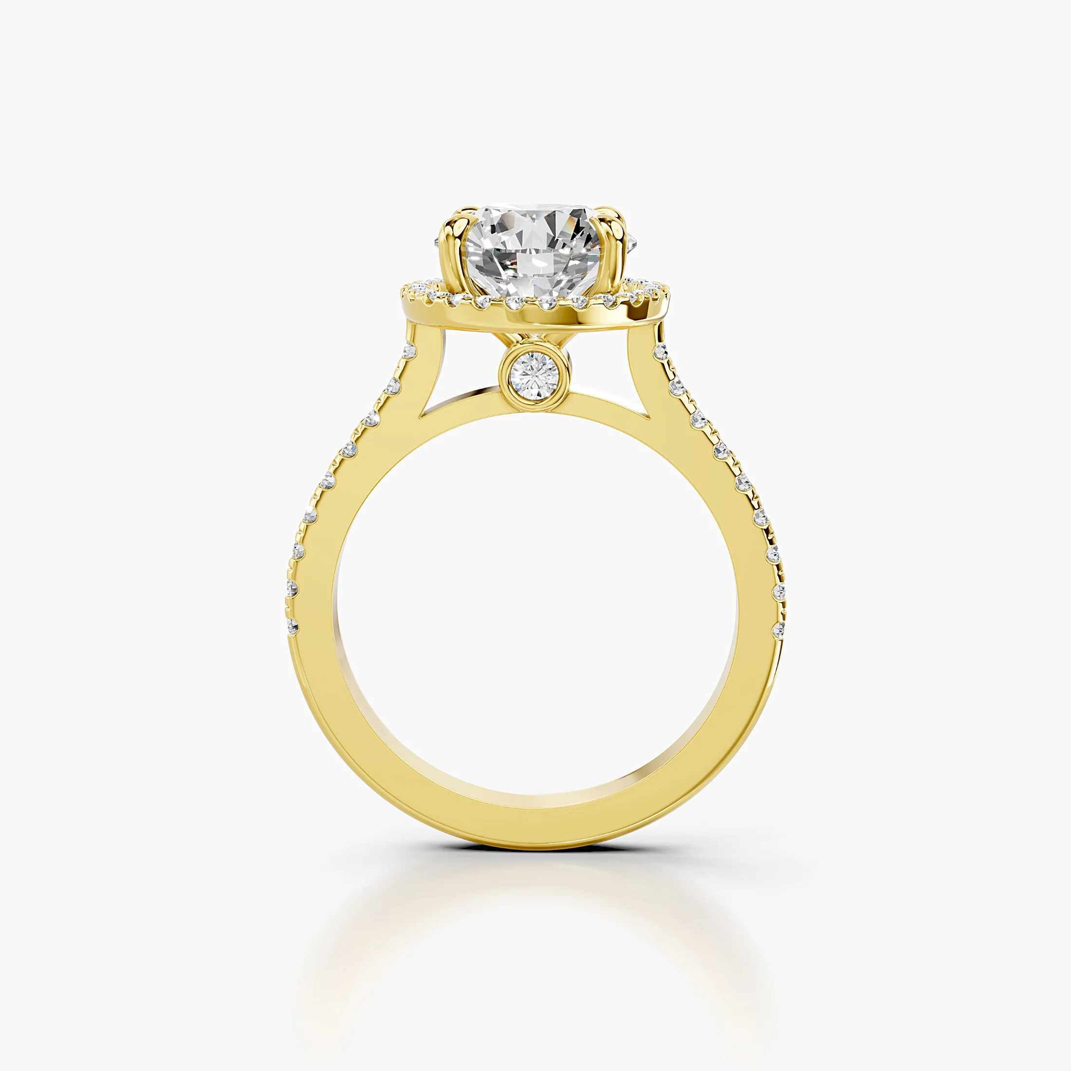 Round-cut lab-grown diamond engagement ring with a circular halo and diamond-set band.