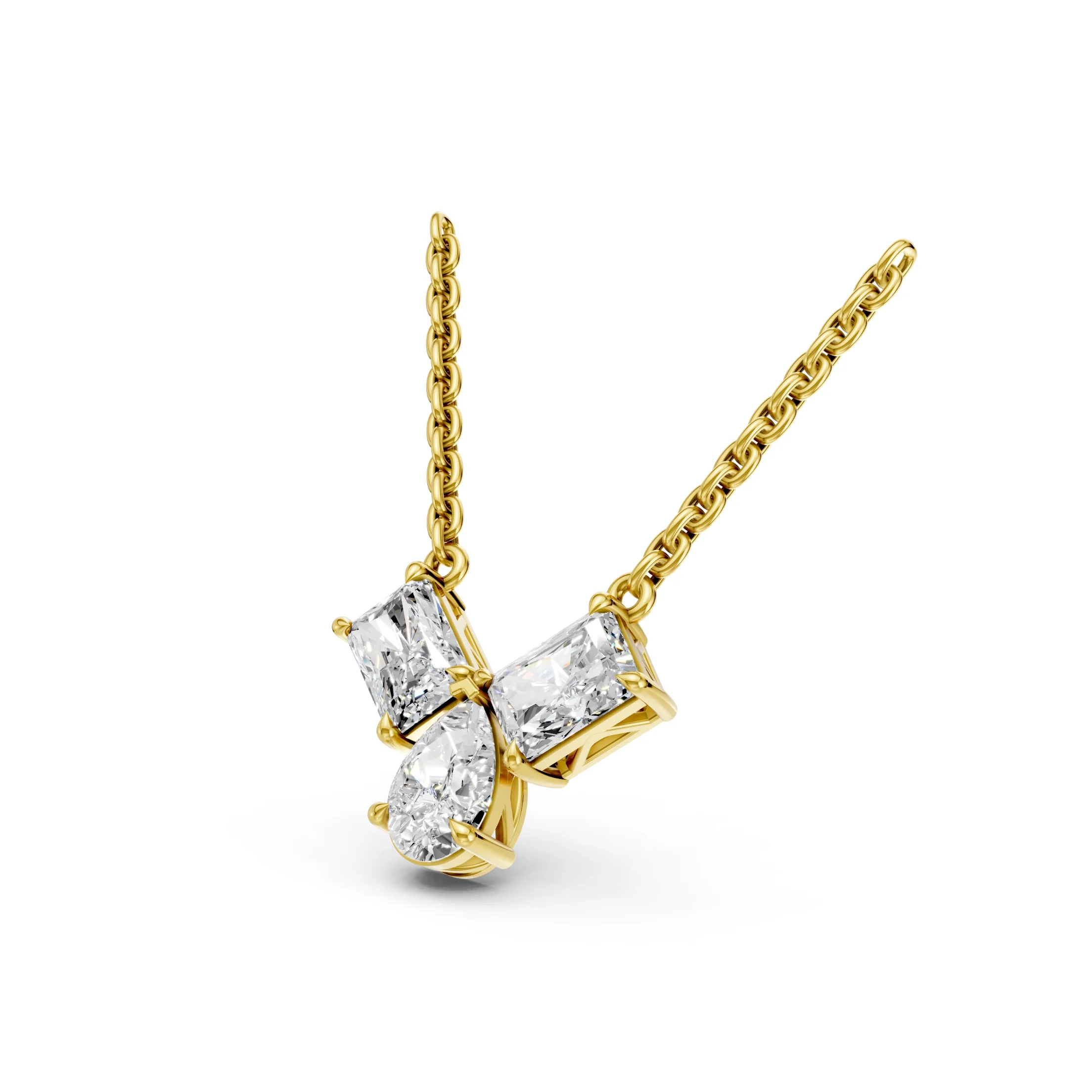 Radiant and pear-cut diamond multi-stone necklace with three diamonds arranged in a V-shaped vertical drop.