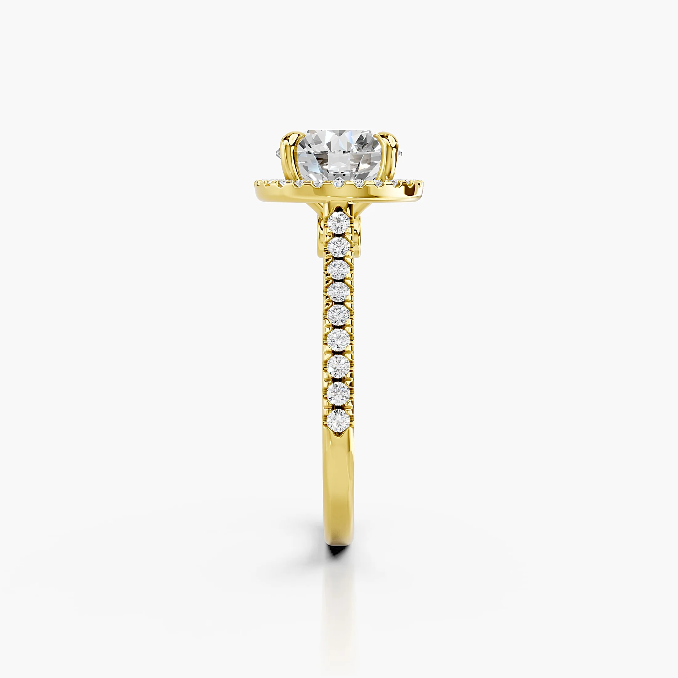 Round-cut lab-grown diamond engagement ring with a circular halo and diamond-set band.