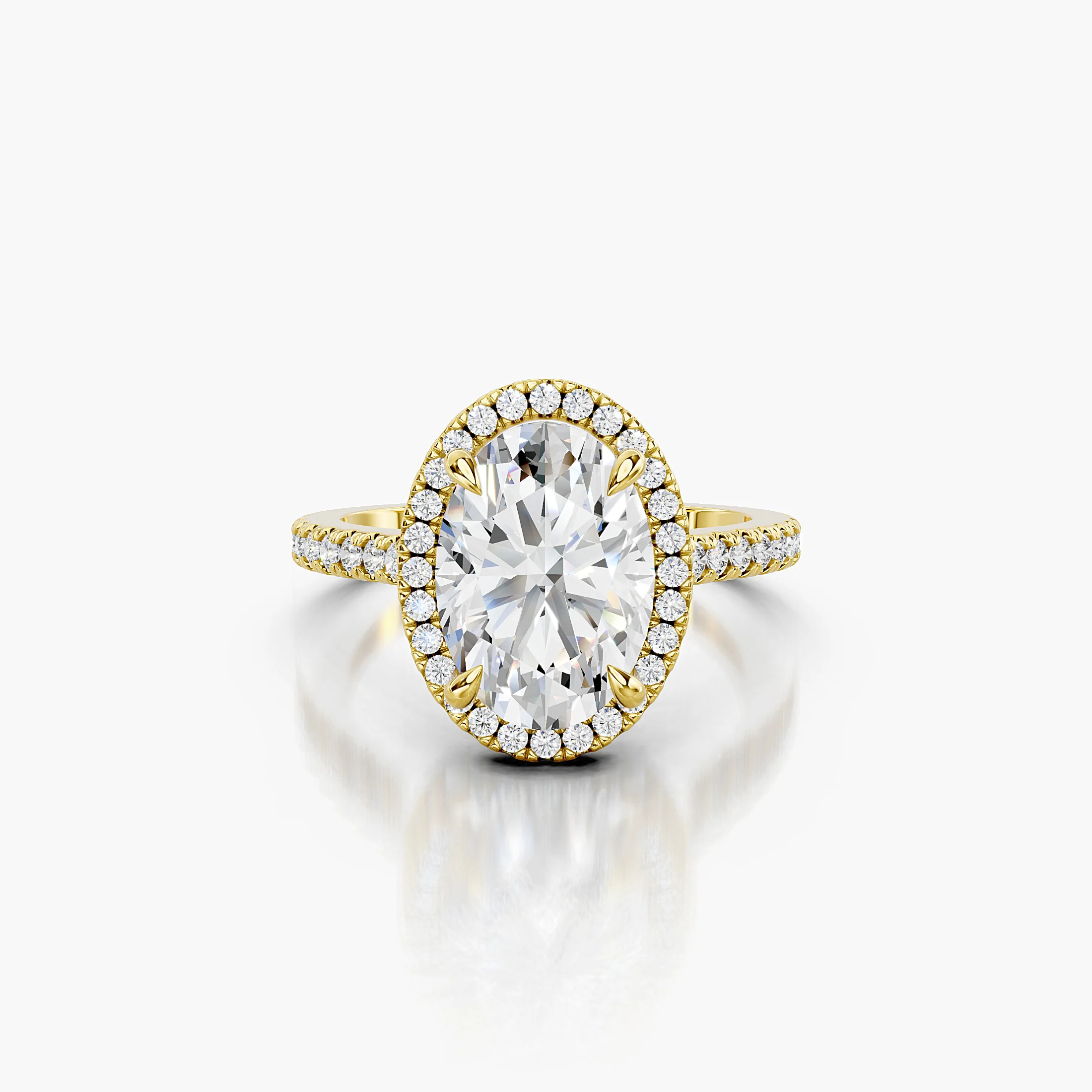 Oval-cut lab-grown diamond engagement ring with a matching halo and diamond-set band.